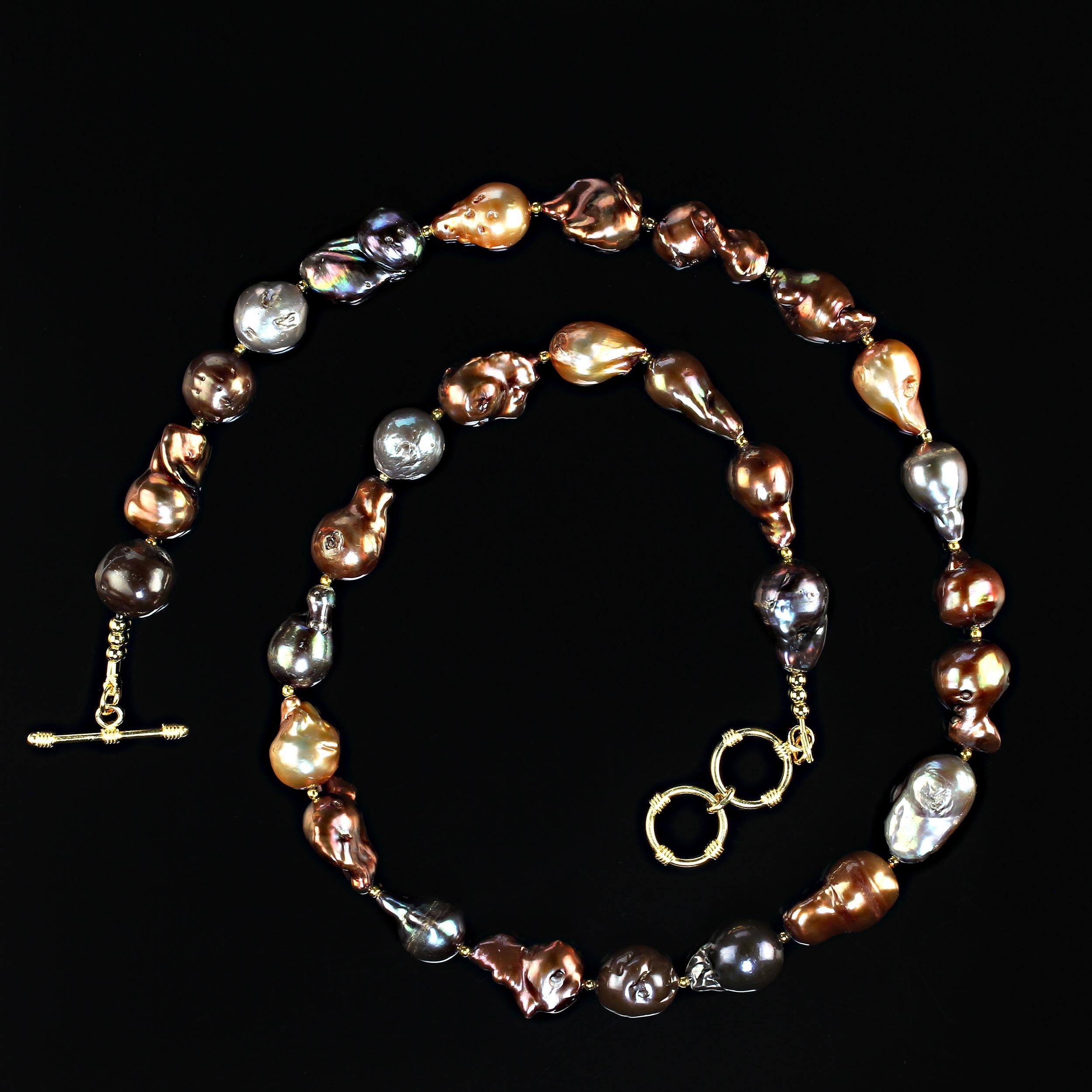 23-24 Inch expandable multi color baroque freshwater pearl necklace with goldy accents.  This elegant necklace features dyed iridescent freshwater pearls in shades of gold, bronze, brown, and gray.  The unique shapes will please and delight your