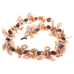 Collana AJD con conchiglie di perle naturali impreziosite da quarzo fumé naturale tagliato a gemma