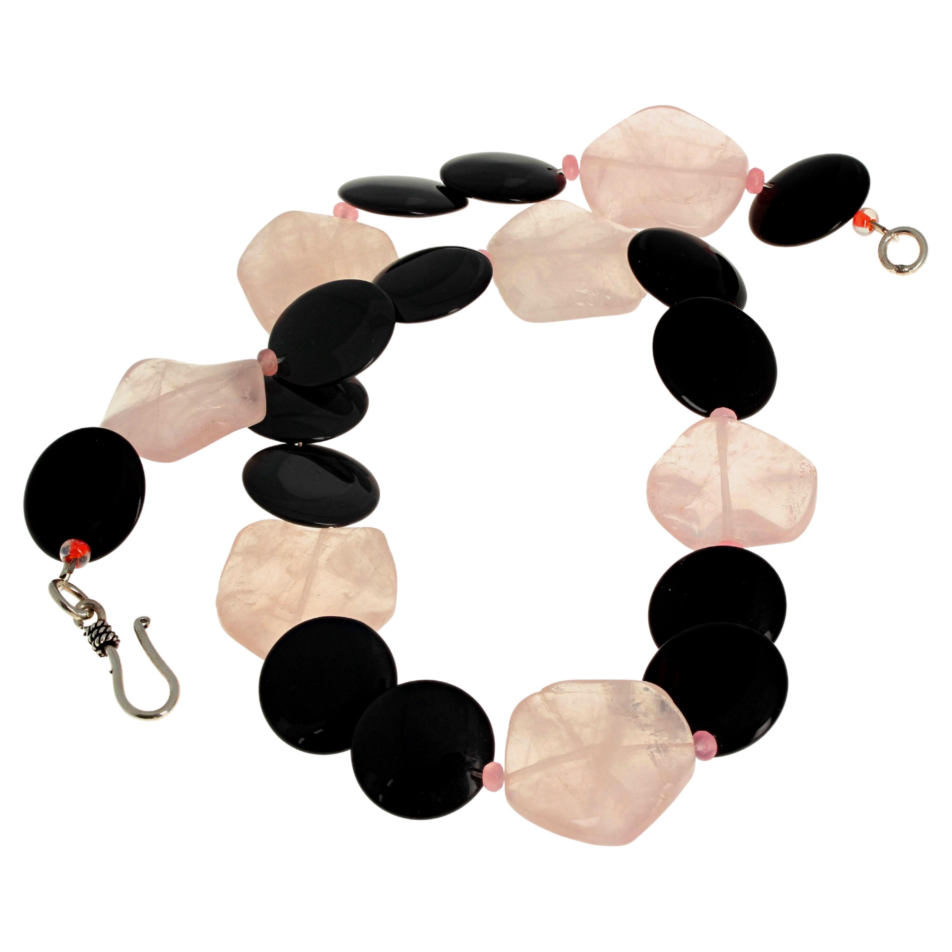 Fascinating and artistic dramatic highly polished Rose Quartz (approximately 25 mm across x 7mm thick) enhanced with highly polished natural black Onyx Rondels (approximately 20mm) and glittering little tiny natural pink Quartz rondels.  This is 20