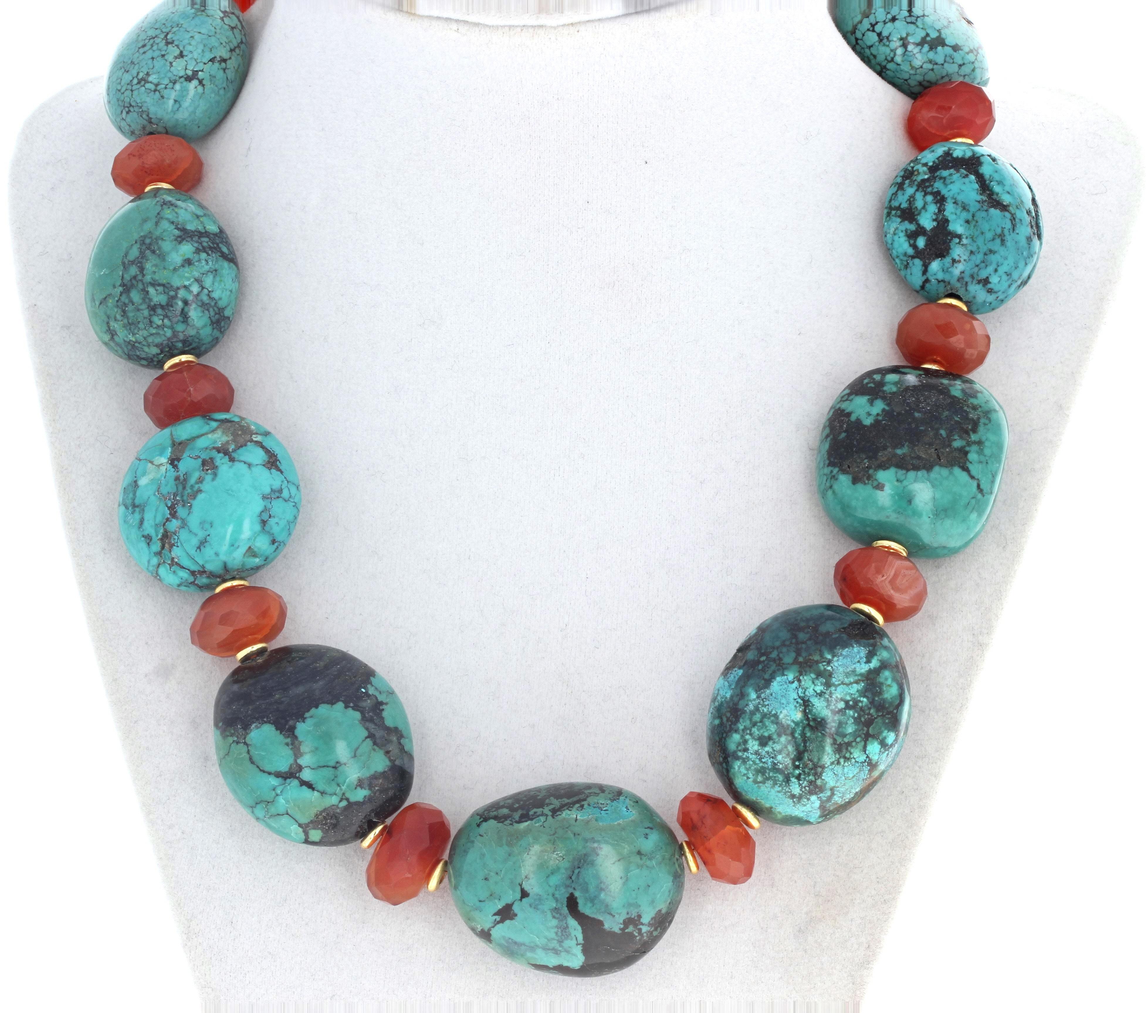 This fascinating and beautiful Chinese Turquoise from Hubei in China is a real intense BluishGreen 18 inch long necklace.  The largest Turquoise is 34 1/2mm x 27 1/2mm.  The beautiful gem cut sparkling orangy natural real Carnelian gemstones are