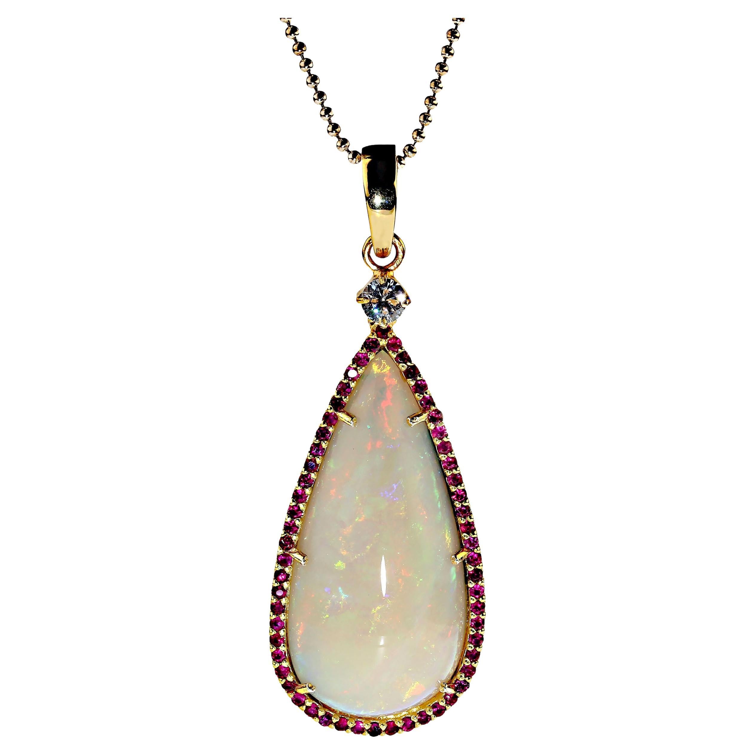 AJD Pendant of Magnificent Teardrop Opal Flashing Red & Green Surrounded by Ruby For Sale