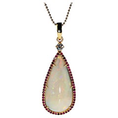 AJD Pendant of Magnificent Teardrop Opal Flashing Red & Green Surrounded by Ruby