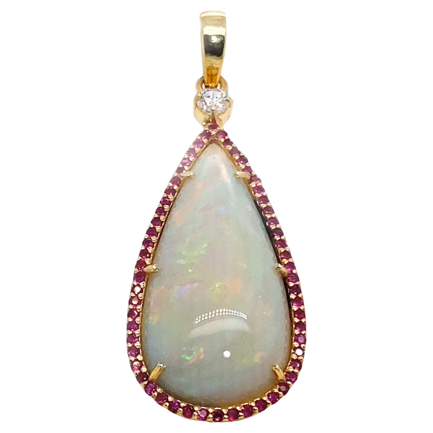 Magnificent 16.98ct Opal Pendant with Red and Green Flashes – Surrounded by Rubies and Zircon
This stunning 16.98ct Opal pendant is a true masterpiece, featuring the most sought-after red and green flashes visible from every angle. With its
