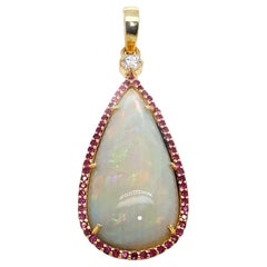 AJD Pendant of Magnificent Teardrop Opal Flashing Red & Green Surrounded by Ruby