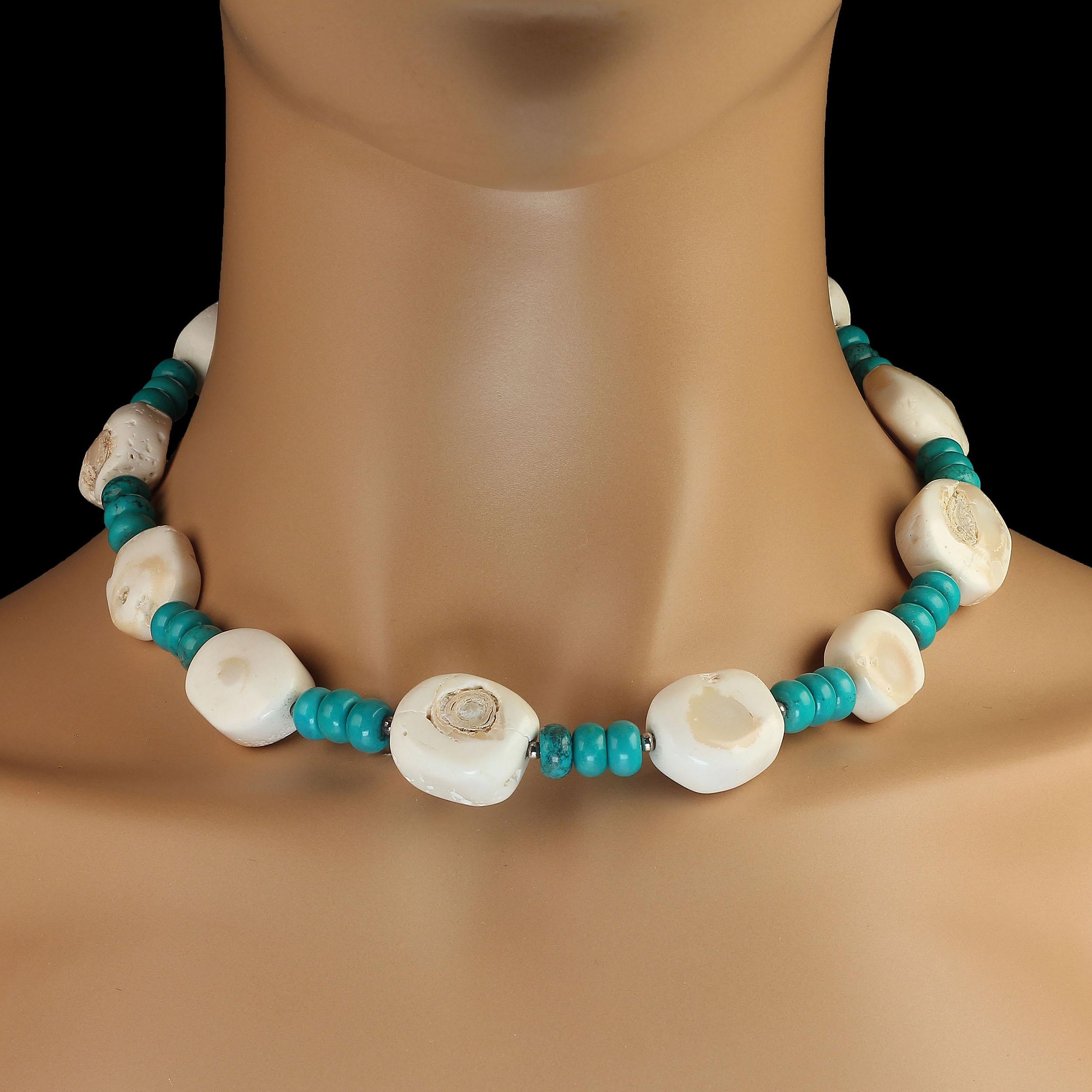 Unique necklace of Composite Turquoise Rondelles and White Bamboo Coral Slices. 18 inches of Blue and White Bliss. White Bamboo Coral with lots of character and tiny silver tone spacers along with composite turquoise rondelles make this handmade