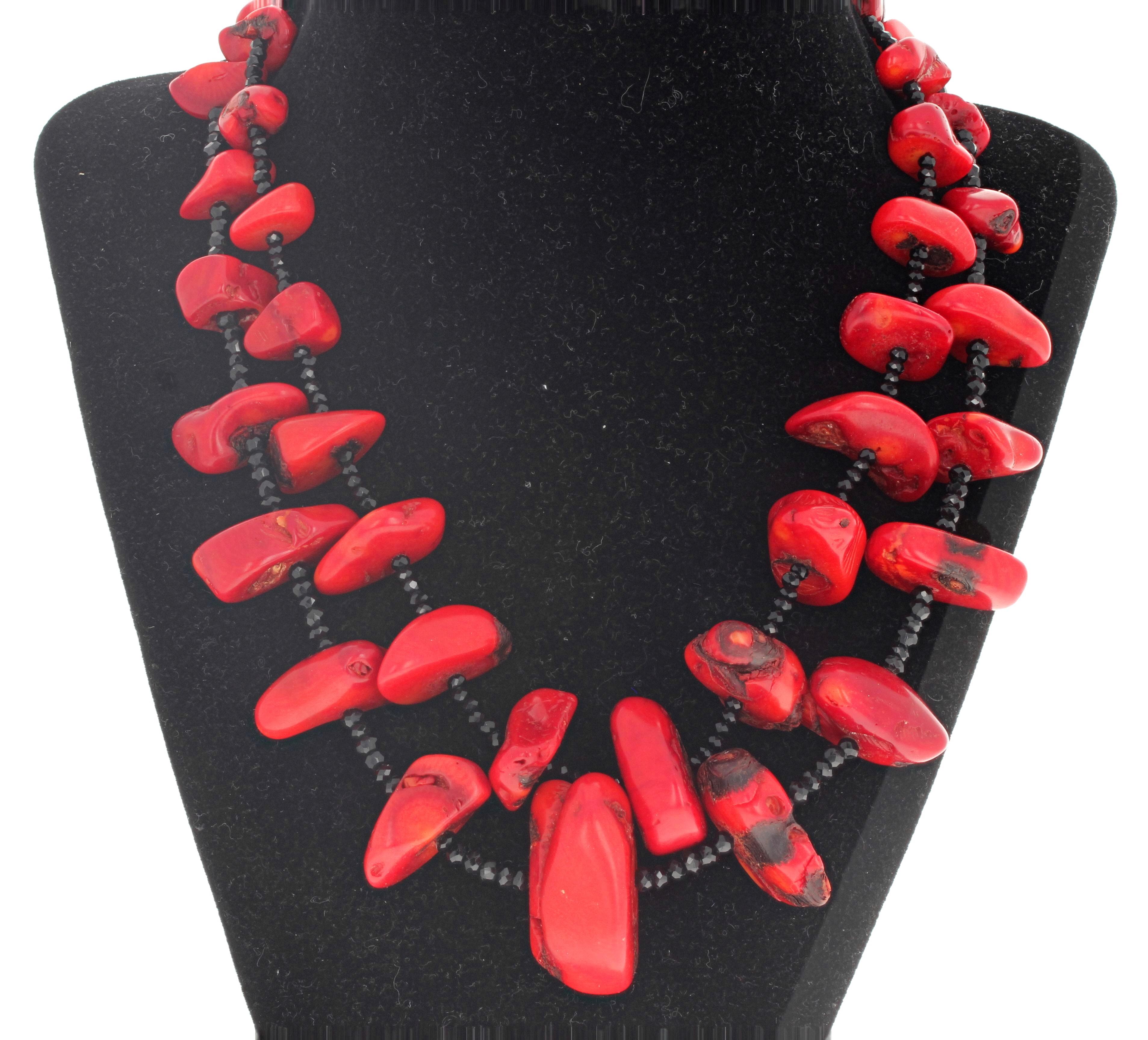 The largest middle natural red Coral in this double strand necklace is 34mm x 16mm.  The glittering gemcut sparkling natural black Onyx are 4mm.  This dramatic fascinating beautiful necklace is 18 inches. long with a gold plated easy to use hook