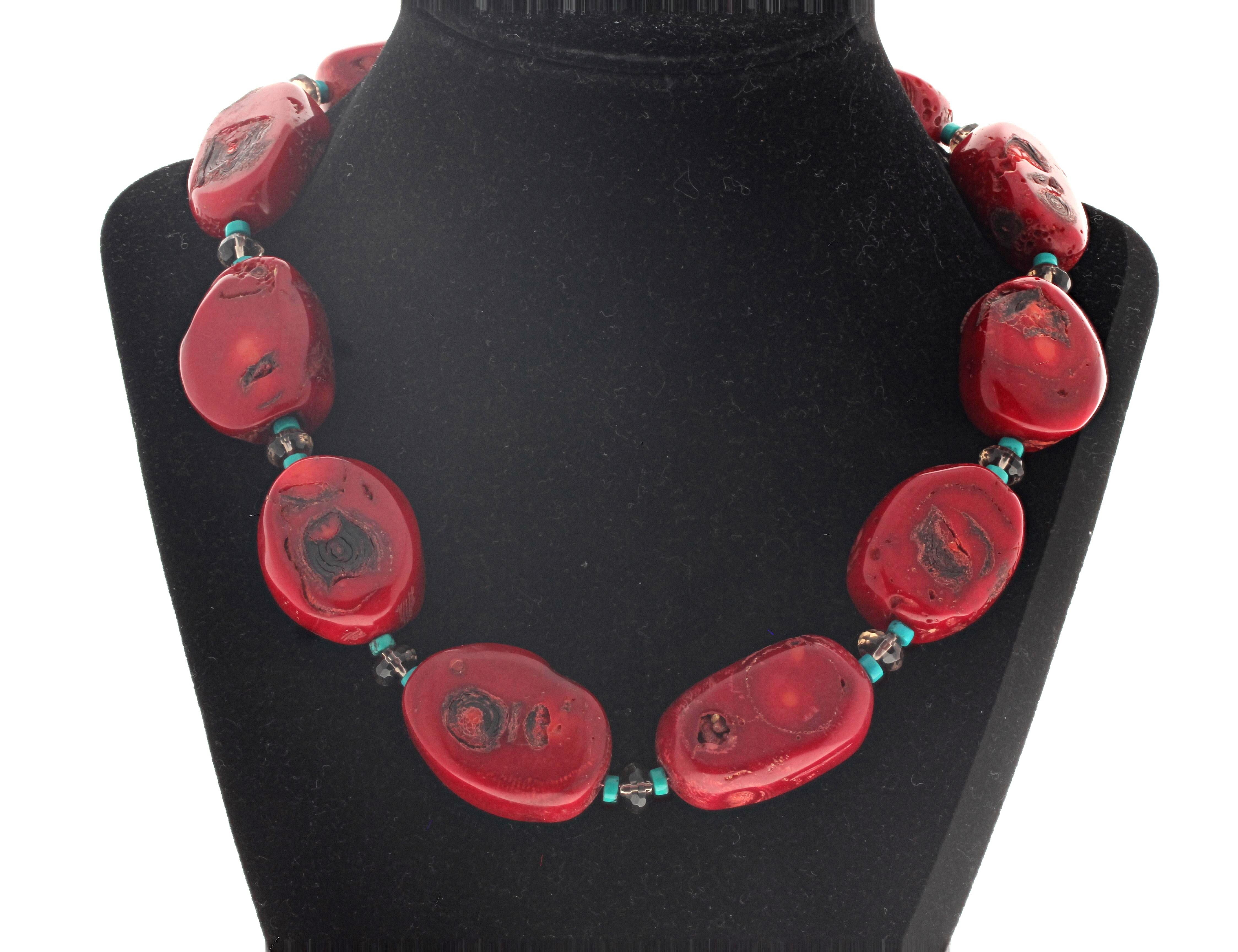This elegant dramatic 18 inch long Coral statement necklace is enhanced by rondels of real Smoky Quartz and real blue Turquoise.  The Coral are approximately 30mm.  The gem cut Smoky Quartz are approximately 8mm.  The Turquoise are approximately