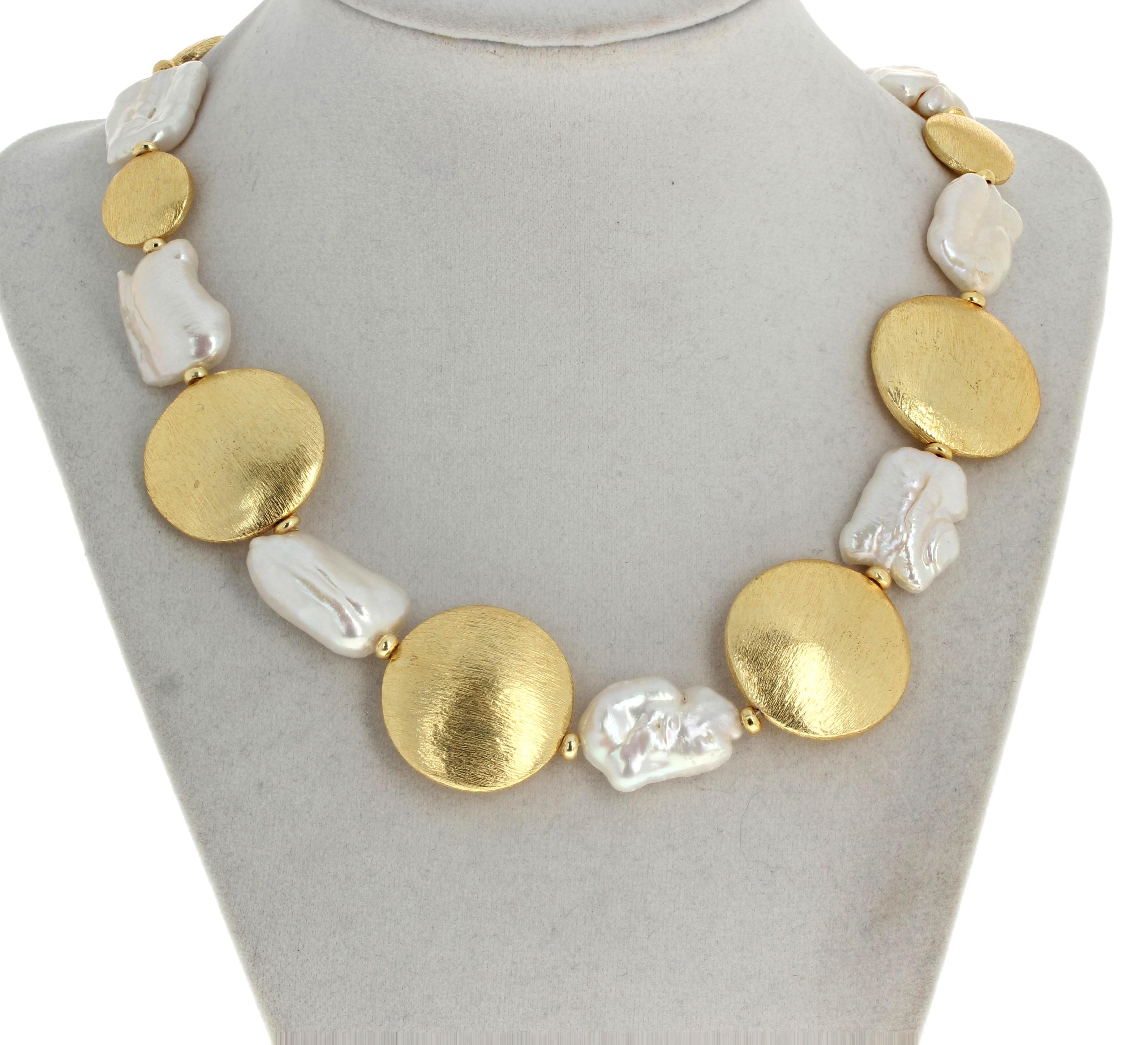 This elegant goldy glowing rondels necklace is 18 1/2 inches long.  The larger goldy rondels are approximately 28 mm and the real natural white Pearls are 22mm x 14mm and the little tiny rondel goldy spacers are approximately 5mm.  The gold plated