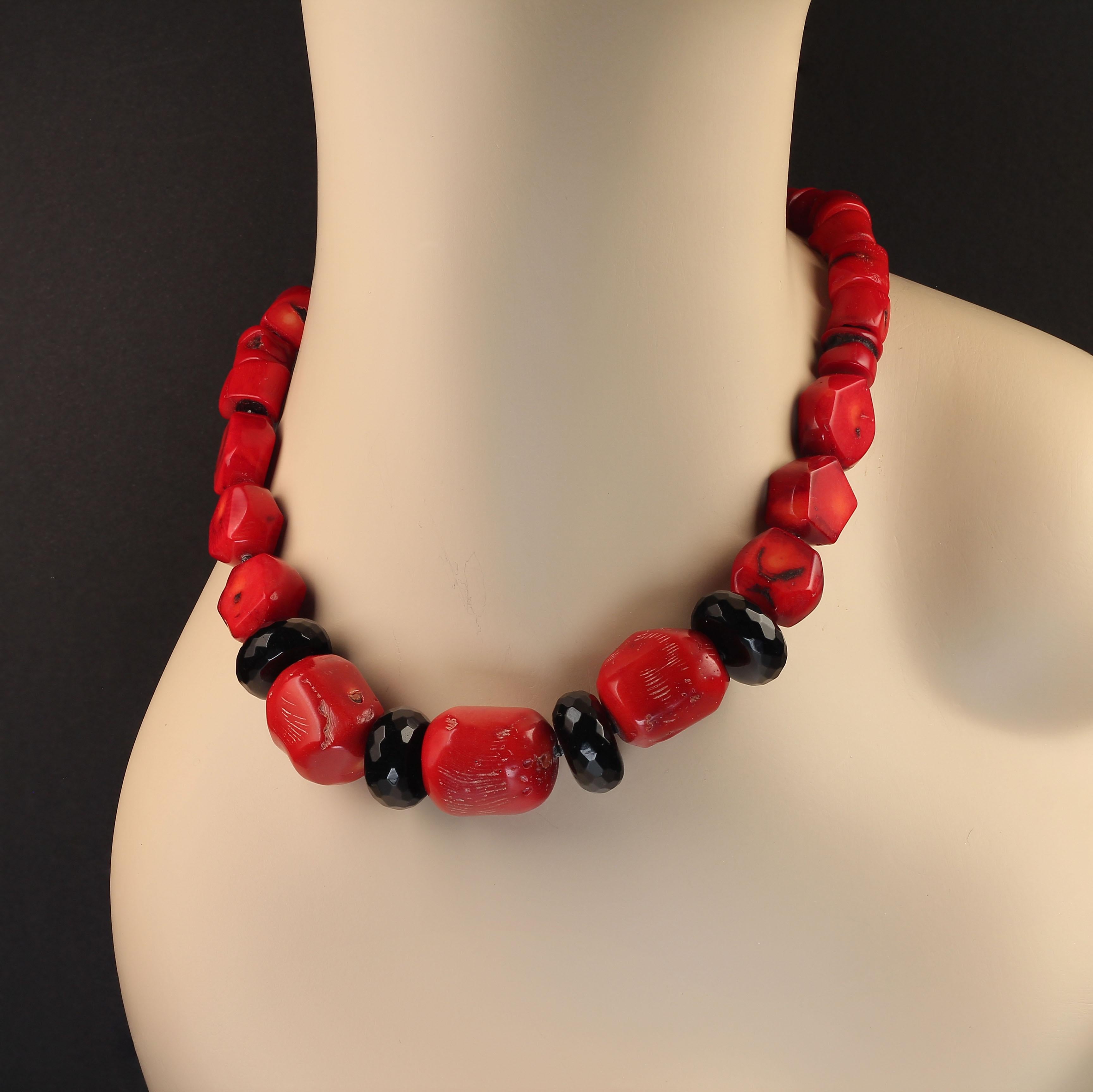 Fashionable Graduated Red Bamboo Coral with Black Faceted Onyx Accents. Larger coral pieces sit in the front of this necklace accented with large sparkling Black Onyx Rondels. This necklace feels so good on your neck. It is just the right size at 19