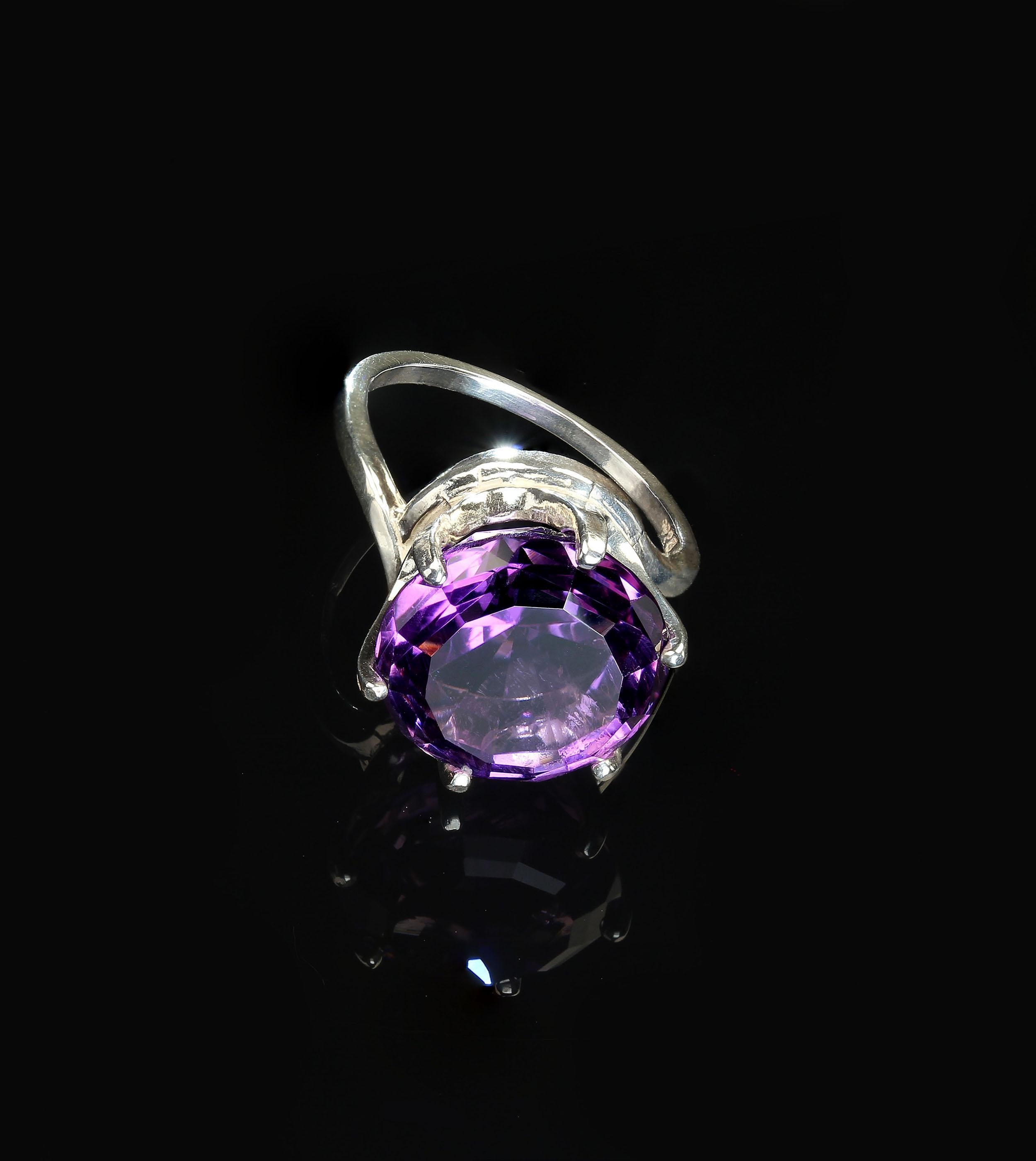 Aria custom made, sparkling Brazilian Amethyst set in lovely six prong Sterling Silver ring.  This unique gemstone came from our favorite supplier in the mountains outside of Rio de Janeiro.  It is a combination of step cut and brilliant cut which