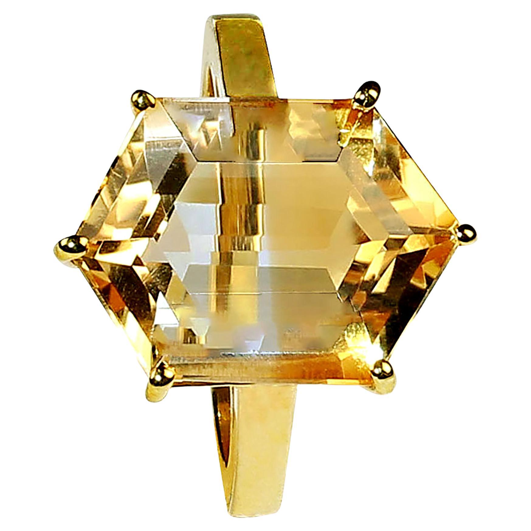 Elegant shield shaped bi-color Citrine set in gold rhodium over Sterling Silver ring.  This 9.56ct gemstone is a true sparkler!  It comes from one of our favorite vendors in Belo Horizonte, Minas Gerais, Brazil.The ancient Greeks and Romans enjoyed