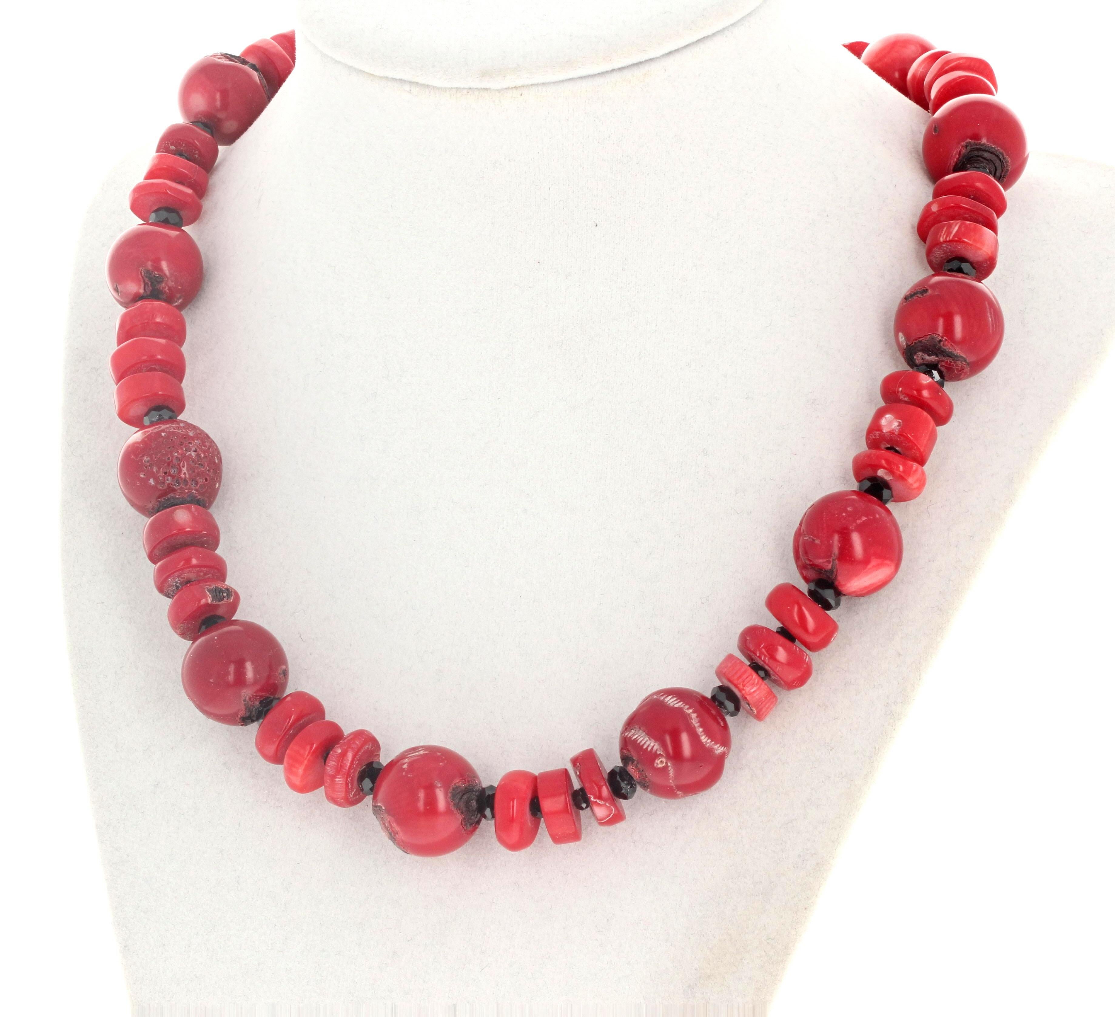 This beautiful highly polished natural real Bamboo Coral 19 inch long necklace is enhanced with sparkling gemcut brilliant natural real black Spinel.  The big round Coral are approximately 16mm  and the smaller slicked ones are approximately 12mm. 