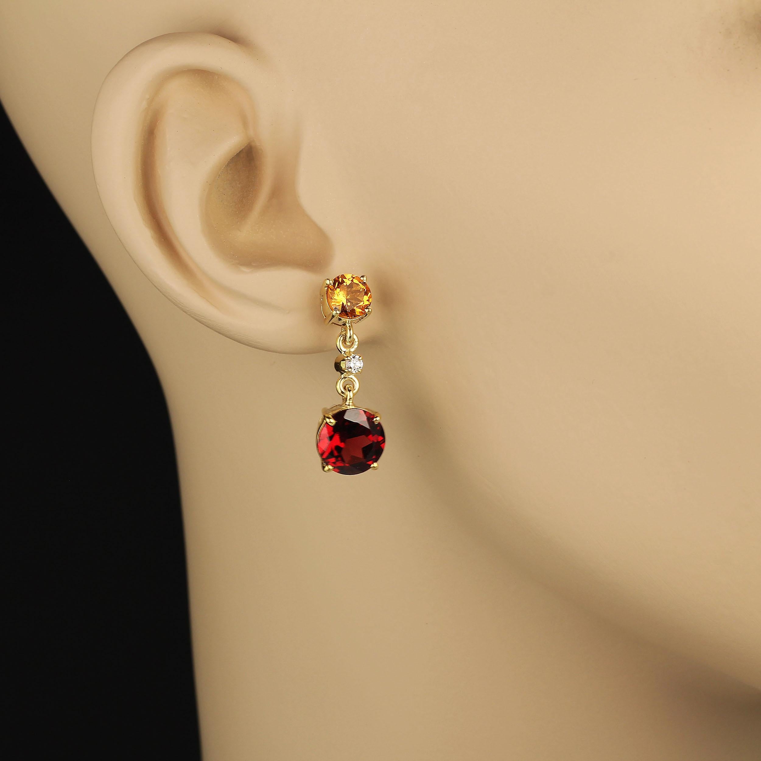 Sparkling Citrine and Garnet dangle earrings in gold rhodium over Sterling Silver handmade settings.  These gorgeous earrings are unique and spectacular, perfect for those who crave the best in gemstones and love drama. Garnet is great gift as it is