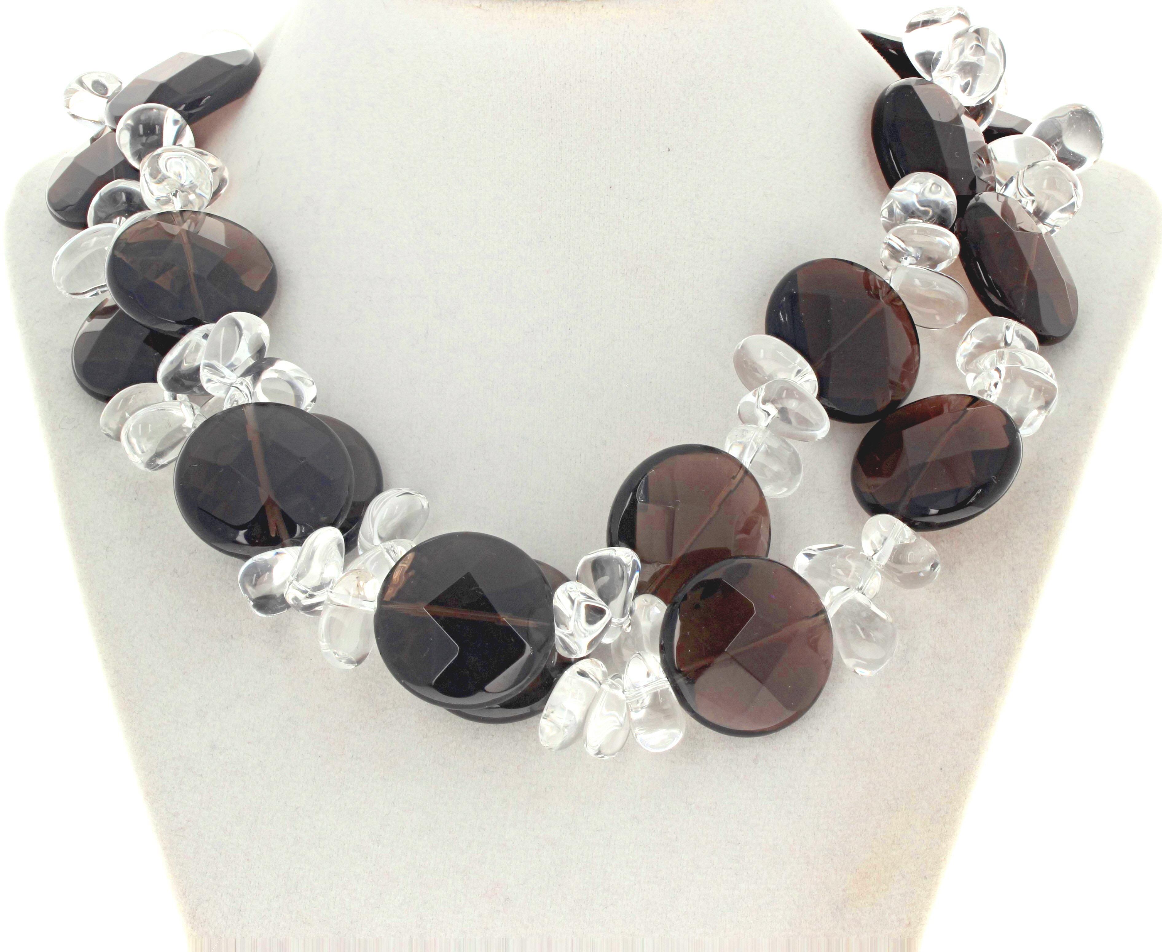 This double strand of glowing gem cut natural Smoky Quartz (approximately 25mm) is enhanced with highly polished chunks of translucent glowing smooth silvery white Quartz gem stones.  The cut and polish of these beautiful Smoky Quartz is very