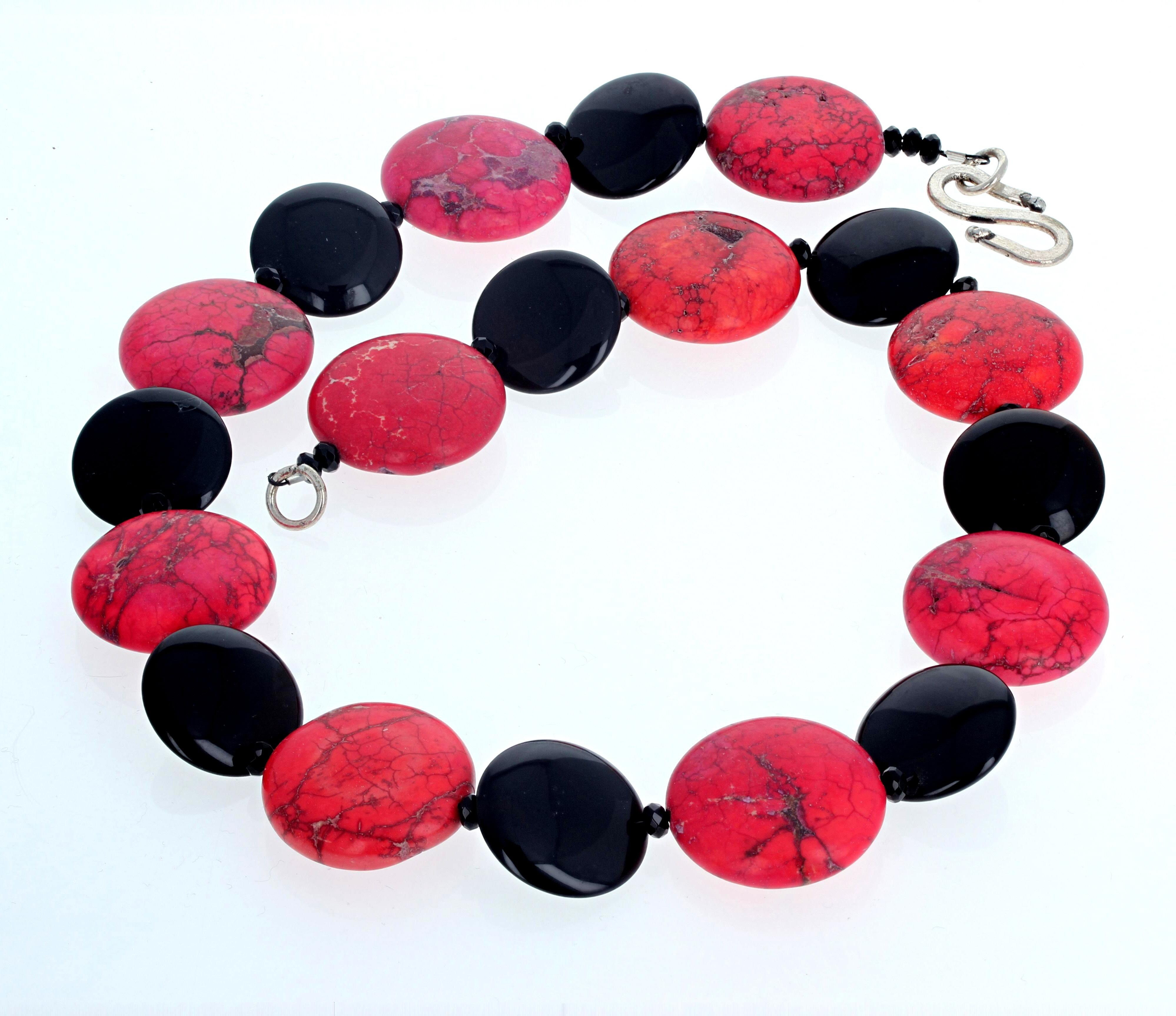 This outstanding statement necklace is 19 1/2 inches long.  The round red natural Howlites are approximately 25mm across and about 8mm thick.  The natural black Onyx are approximately 20mm across and about 5 1/2mm thick.  This is enhanced with
