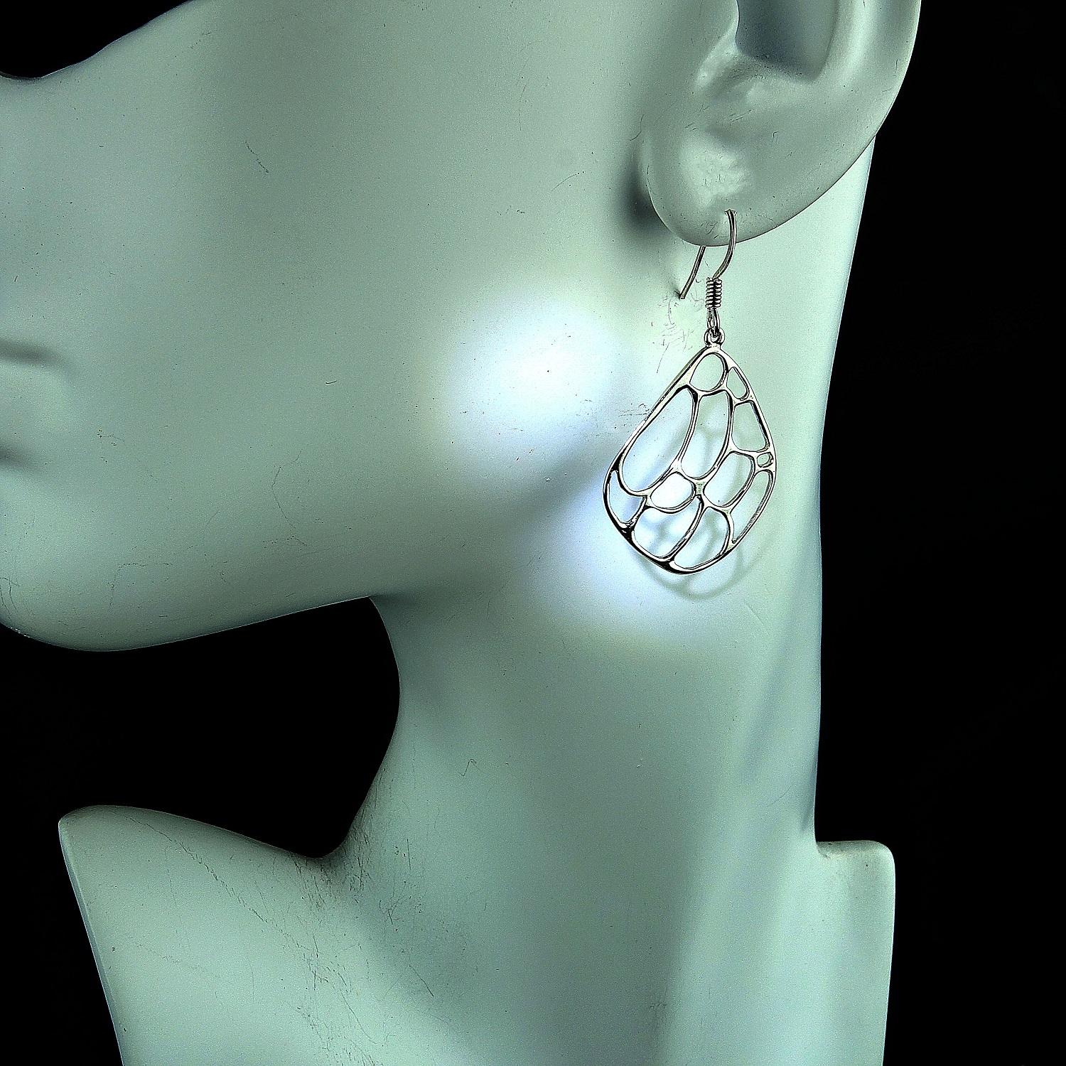 Light and lovely Sterling Silver leaf motif earrings. These open work earrings are 1.75 inches from the top of the French hook to bottom and 1 inch across.  You will enjoy wearing these light weigh earrings which have lots of movement swaying with