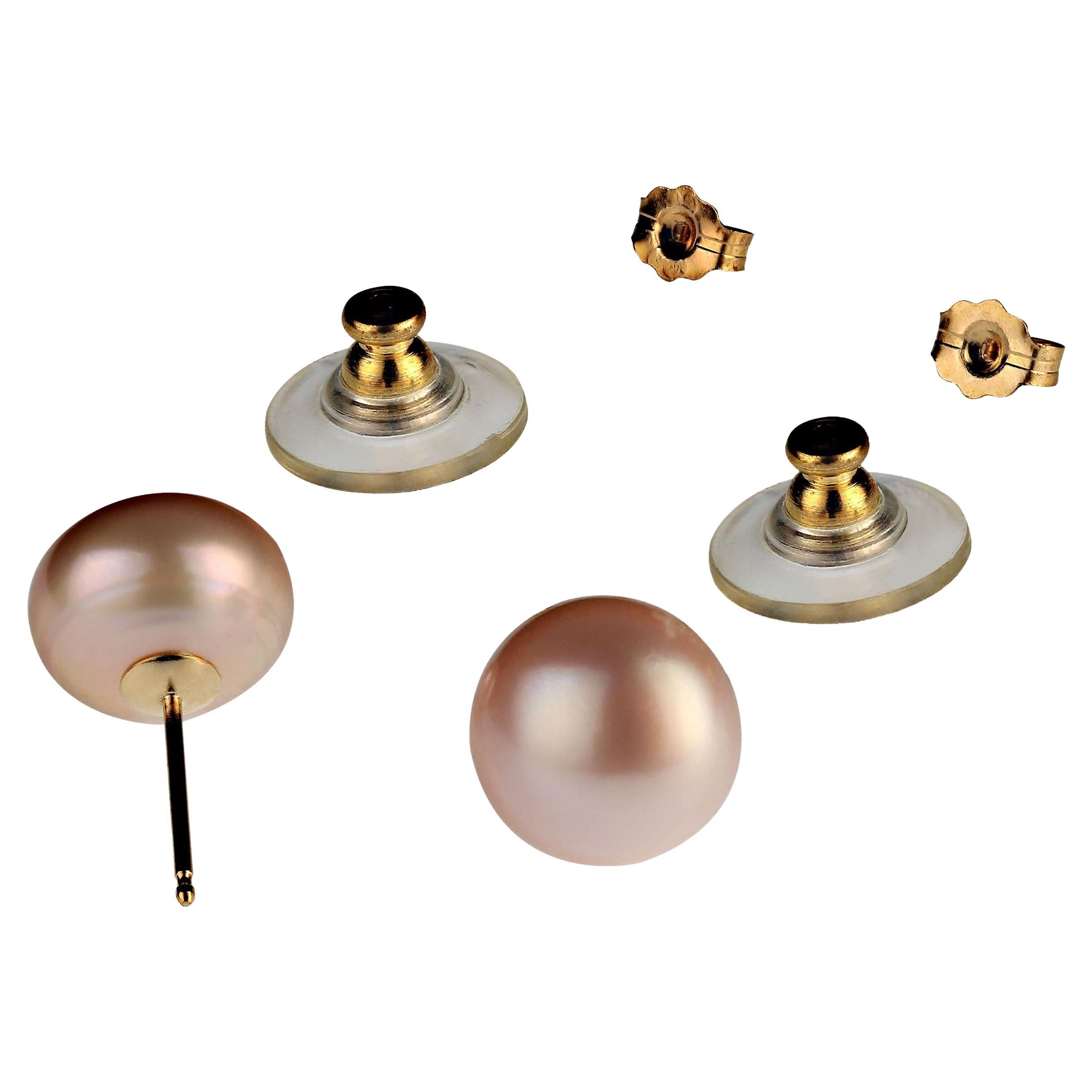 Your classic jewelry must have, lustrous, glowing 10.5MM Pearl Studs. These gorgeous studs are glowing pinky with 14k yellow gold posts and butterfly backs, and cushion backs.  The cushion backs ensure comfort and keep the pearl secured properly on