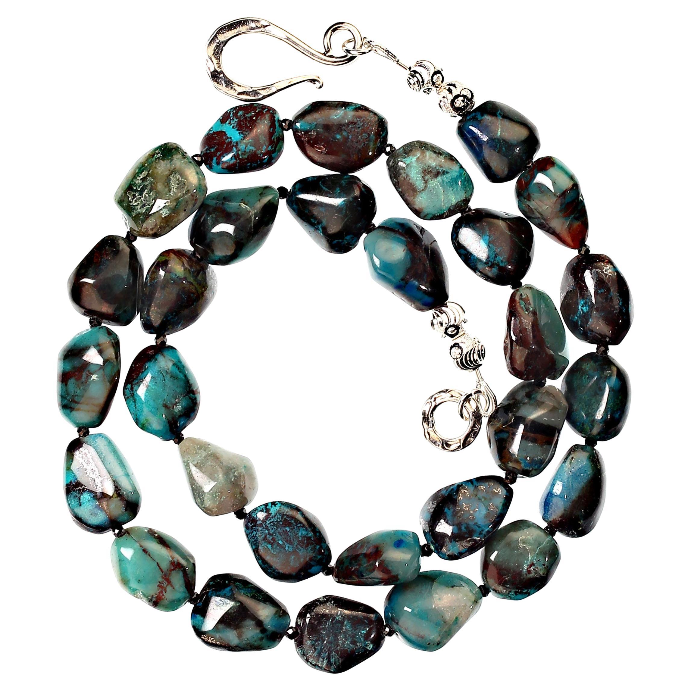Stunning 20-inch necklace of highly polished African Azurite. This gorgeous Azurite exhibits various shades of blues and greens as well as the usual black, brown, and gray matrix. These are highly polished freeform nuggets gently graduated and