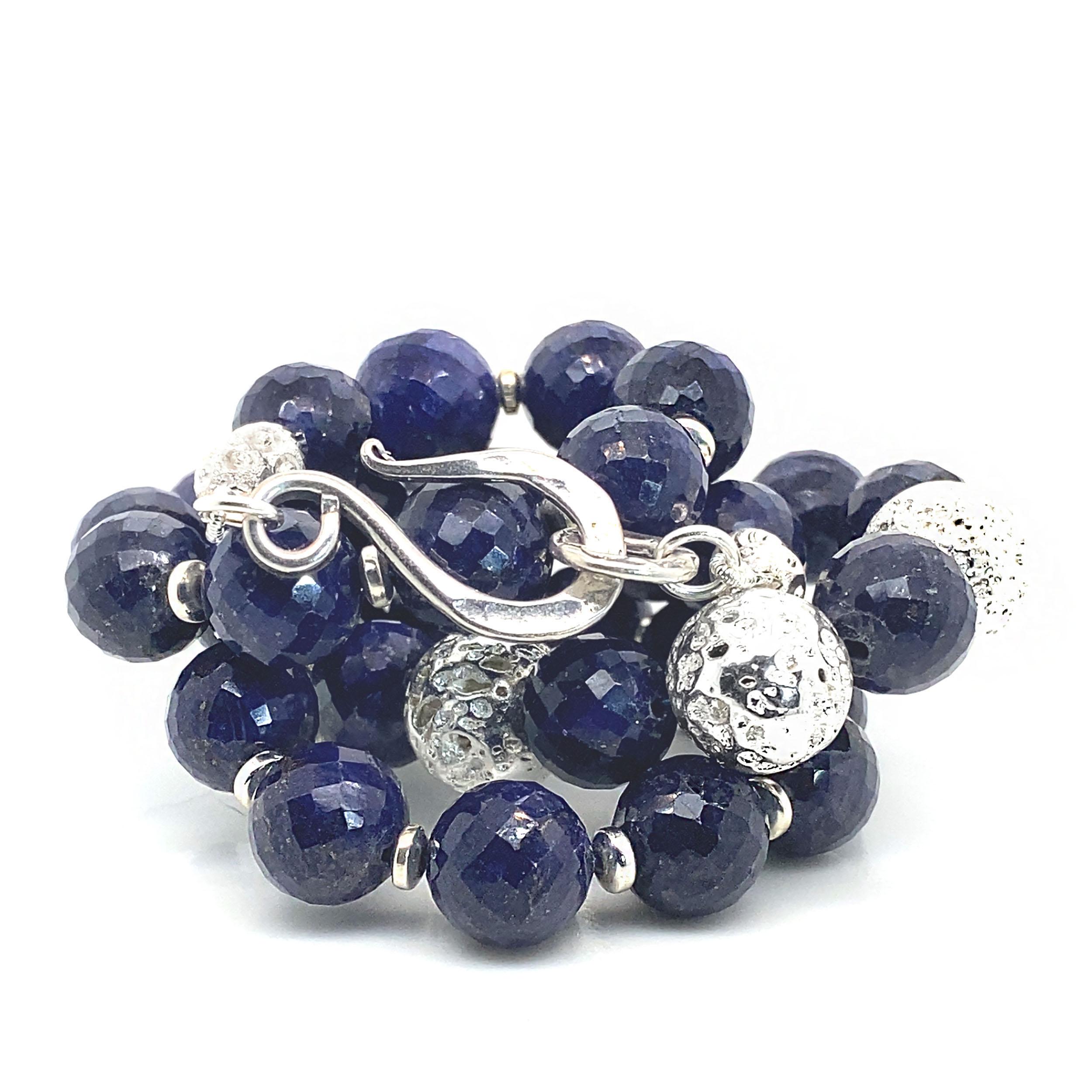 Stunning 21-Inch Blue Sapphire Necklace with Silver Lava Rock Accents
Add sophistication and sparkle to your jewelry collection with this 21-inch Blue Sapphire necklace featuring faceted 11 mm Blue Sapphire beads and eye-catching silver lava rock