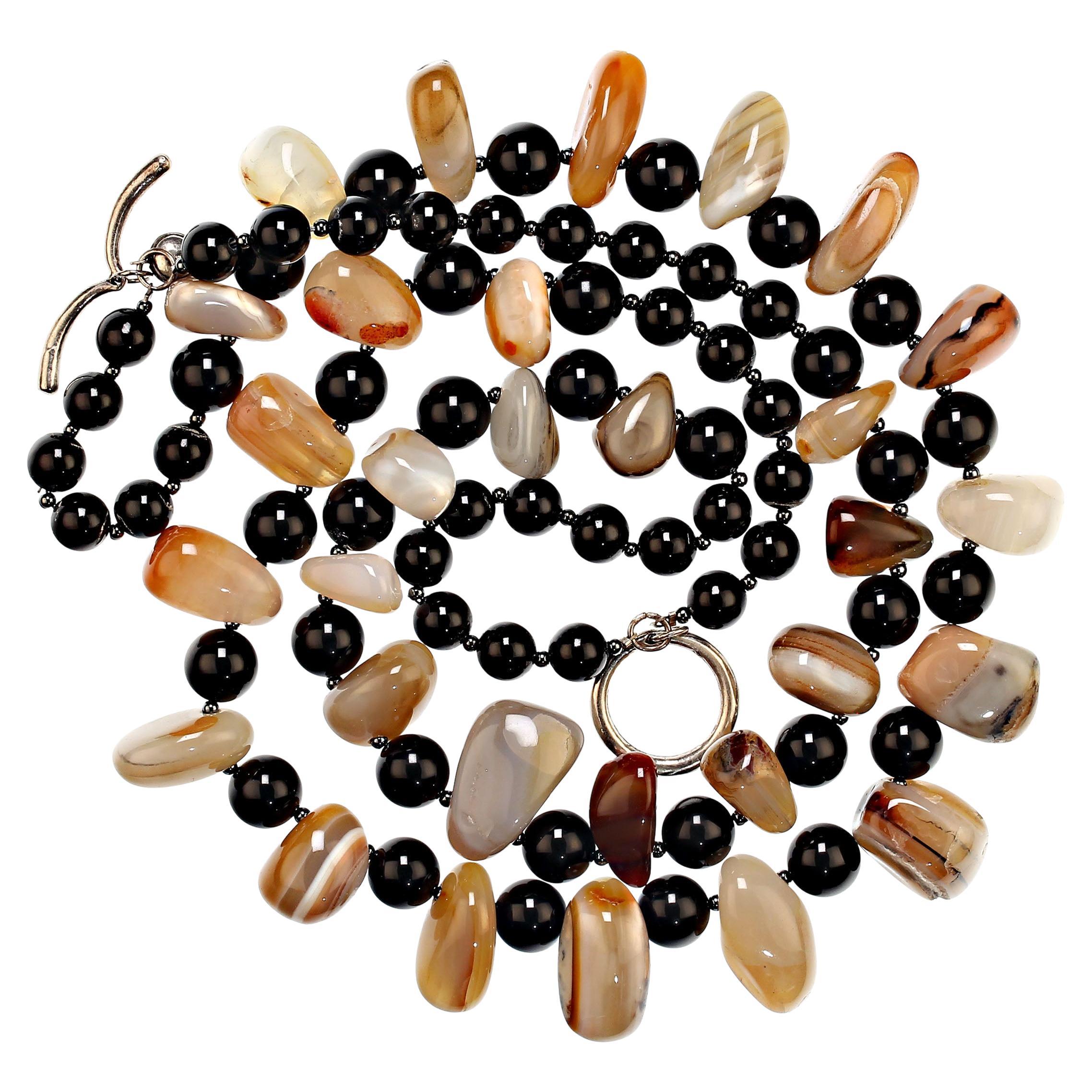 Stunning Botswana Agate Nugget and Black Onyx two strand necklace. The two strands are 17 and 21 inches in length and are secured with a large easy to use silver toggle clasp. Botswana agate is so beautiful and comes only from the country of