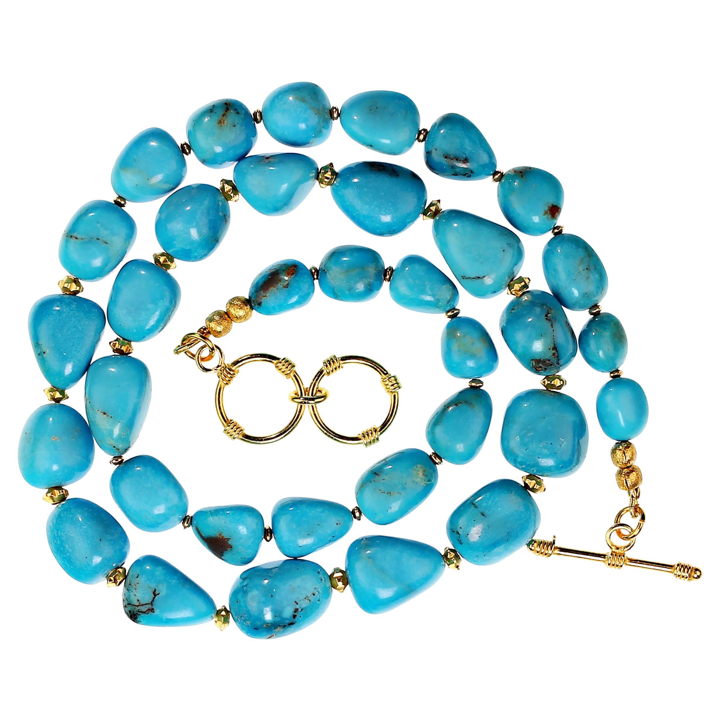 Stunning necklace of graduating Sleeping Beauty turquoise nuggets, 9-14mm.  These gorgeous nuggets have 22k gold plated accents and a gold-plated expandable toggle clasp. The necklace expands 21-22 inches.  MN2313