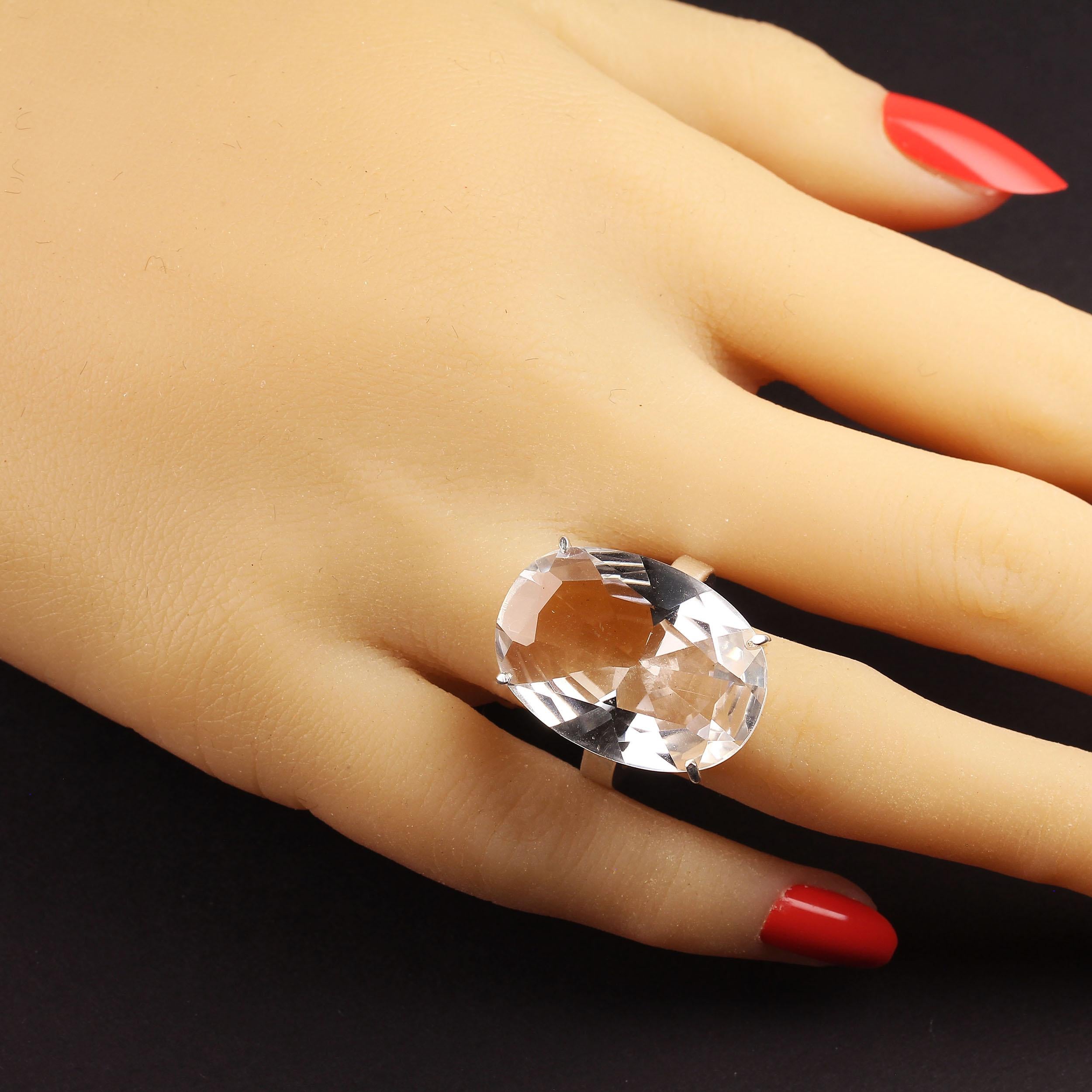 This sparkling oval fancy cut Quartz Crystal and Sterling Silver ring is just what you need for summer. This gorgeous quartz crystal is supposed to be an amplifying stone which means that whatever you put into it, it will return many times. Think of