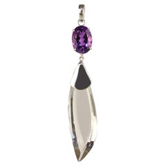 AJD Swing and Sway with This Unique Amethyst and Crystal Pendant