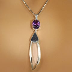 AJD Swing & Sway with This Unique Amethyst & Crystal Pendant February Birthstone