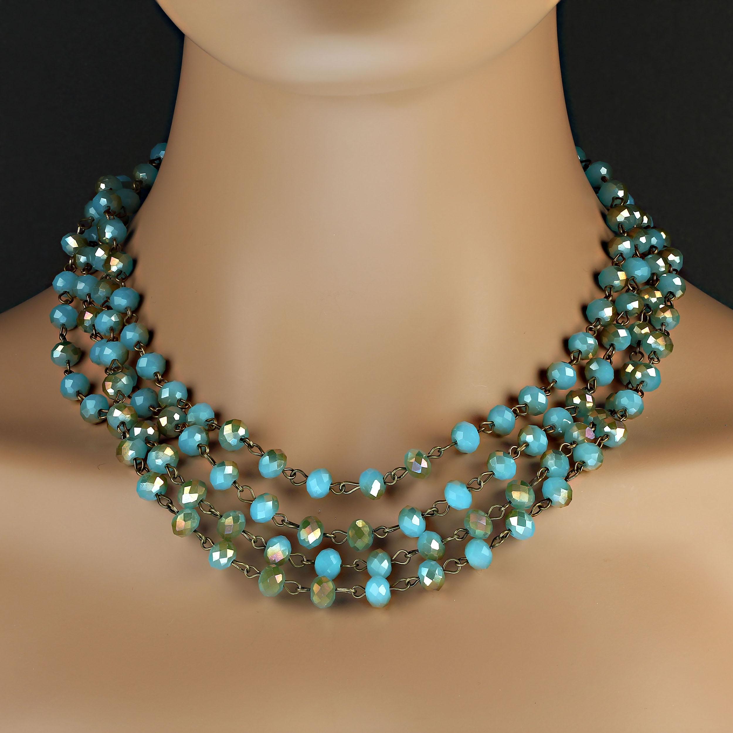 Custom made 80 inch teal crystal bead necklace.  These are lovely 'AB' crystals which means that they flash bronzy gold over the teal as they turn. As a long 80 inch length this is very versatile.  This unique necklace can be worn as one very long