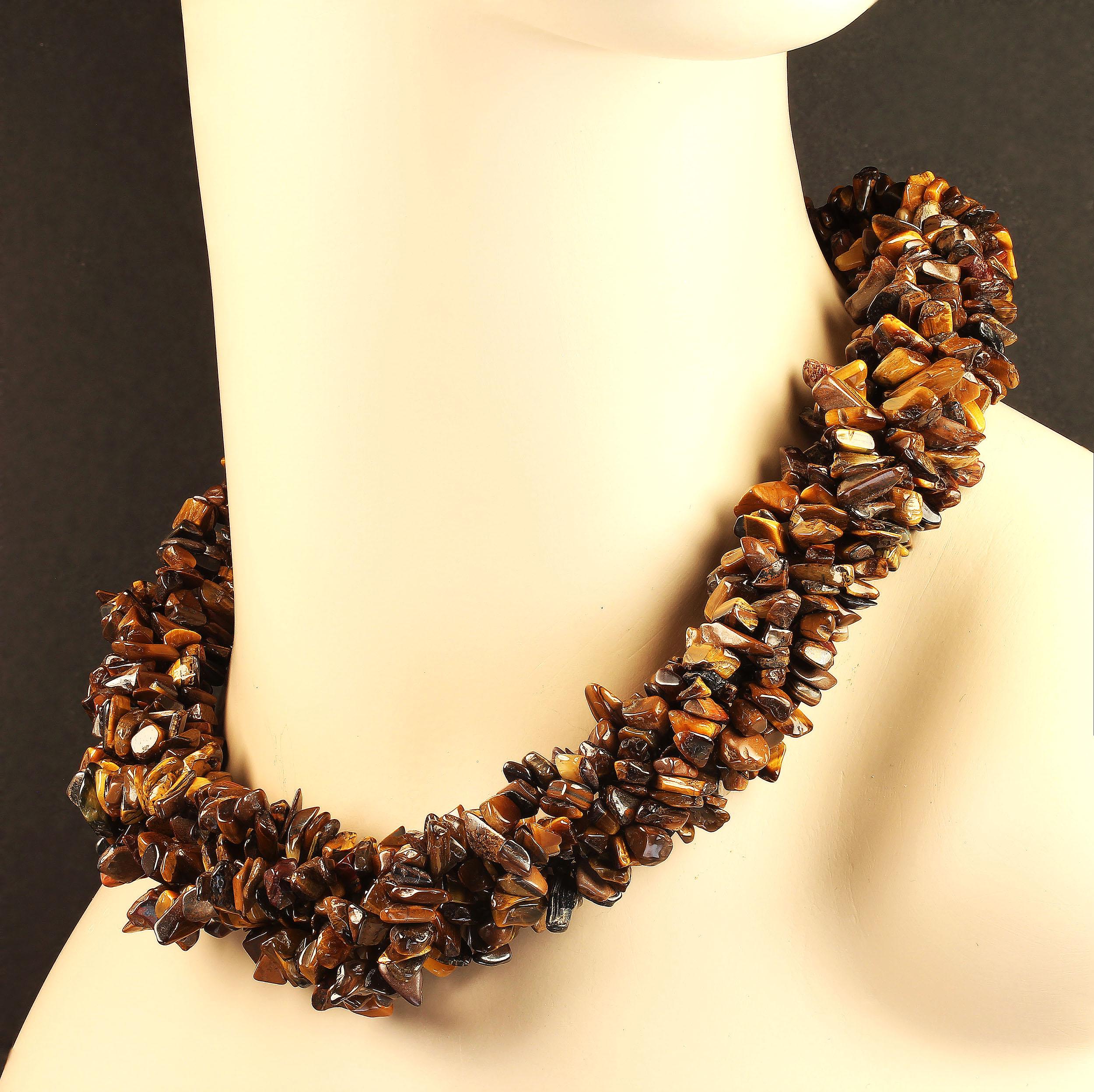 Three 36 inch infinity necklaces of chatoyant Tiger's Eye.  These wonderfully versatile necklaces can be worn long or twisted for a shortened more elegant tailored look.  Tiger's Eye is a form of chatoyant quartz.  This brown Tiger's Eye is highly