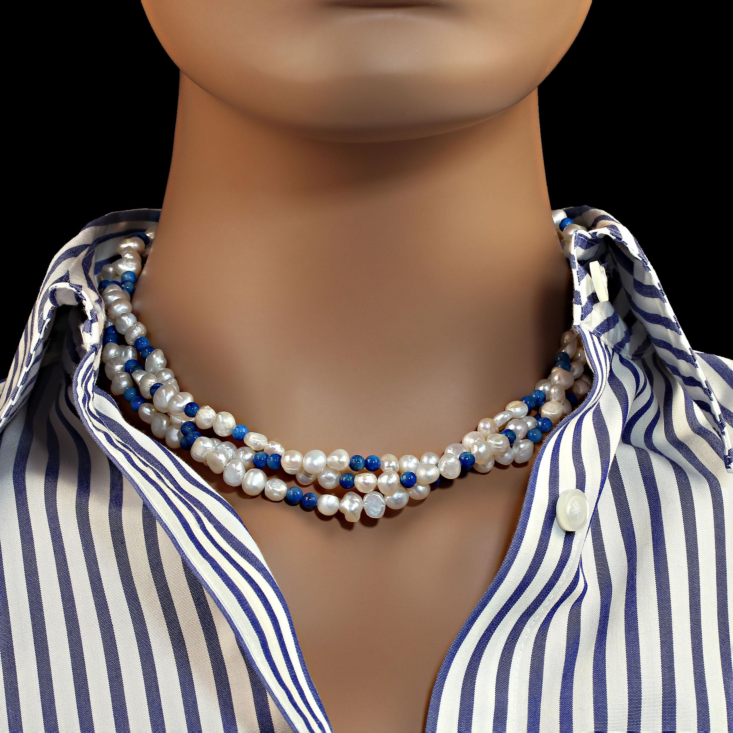 Because you deserve to wear Pearls
Unique necklace of three strands of glowing iridescent White Pearls and highly polished 4 MM blue Lapis Lazuli. The pearls and lapis lazuli are arranged differently in each of the three strands which are loosely