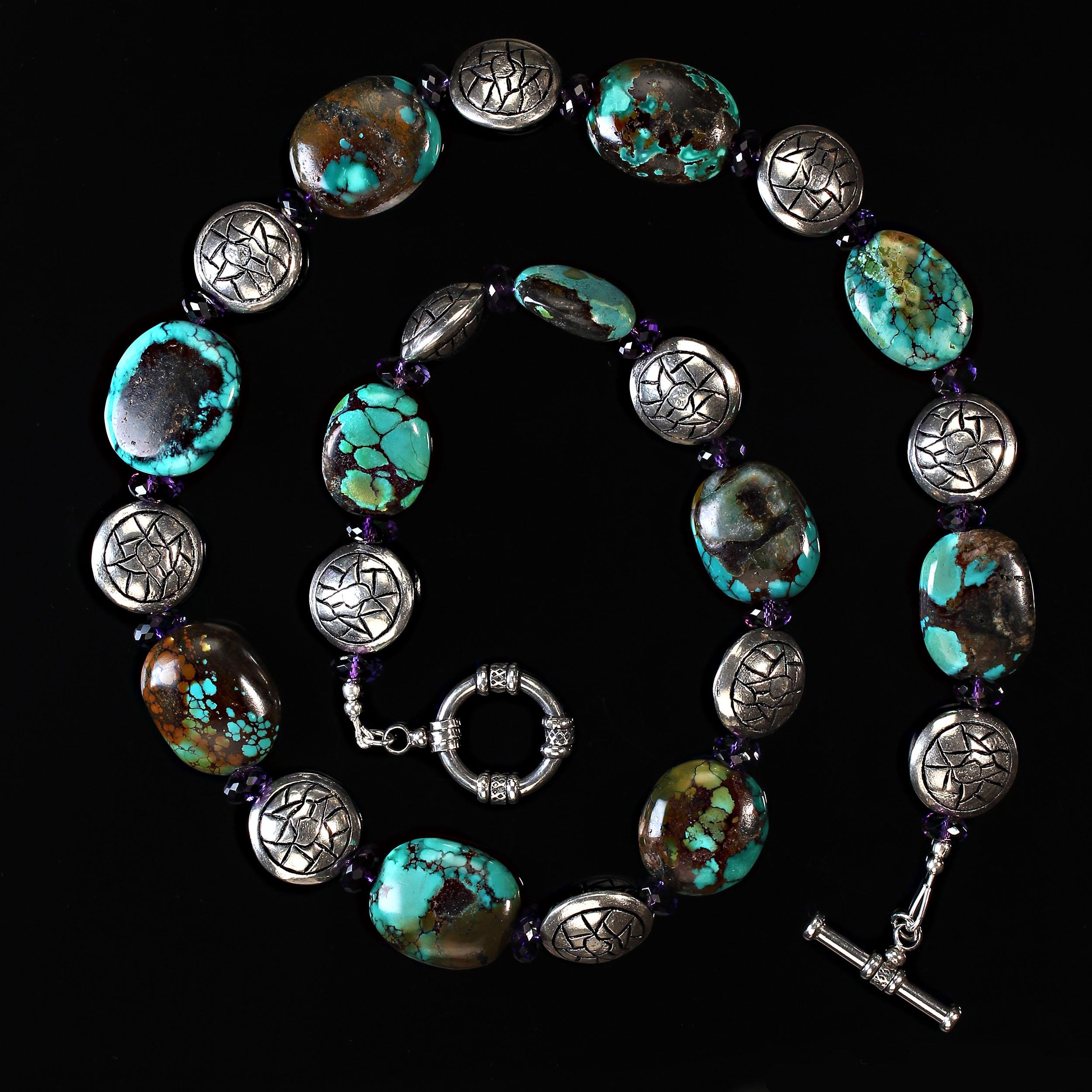 26 Inch necklace that features Hubei turquoise, sparkling amethyst rondelles, and distinctive silver tone etched discs.  This lovely necklace is secured with a large silver toggle clasp. MN2341