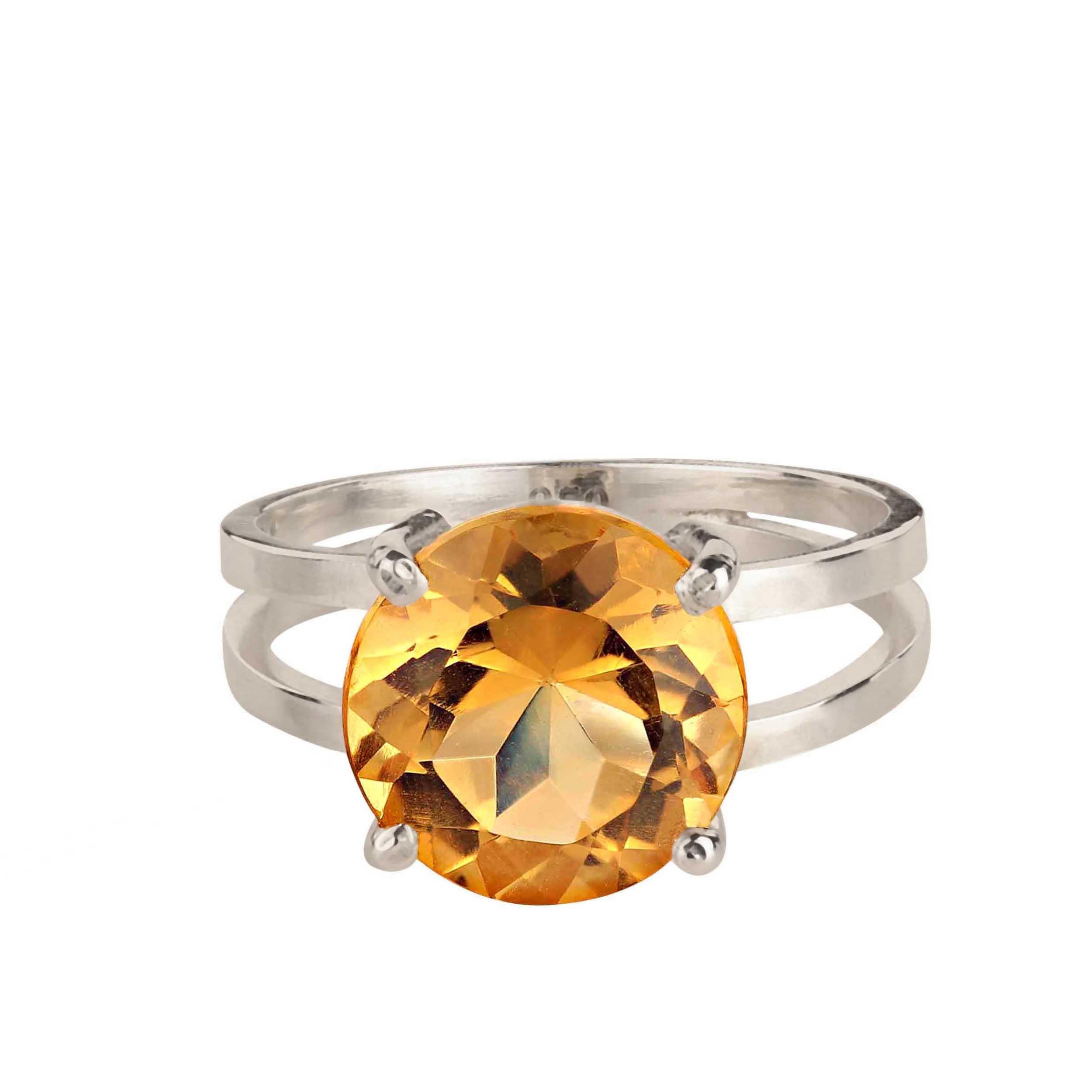 Unusual round 4.3Ct Citrine in handmade Sterling Silver ring.  This handcrafted Sterling Silver ring was created in shop of our favorite vendor in Belo Horizonte, Minas Gerais, Brasil. The 11MM round Citrine is a gorgeous honey color and sits in a