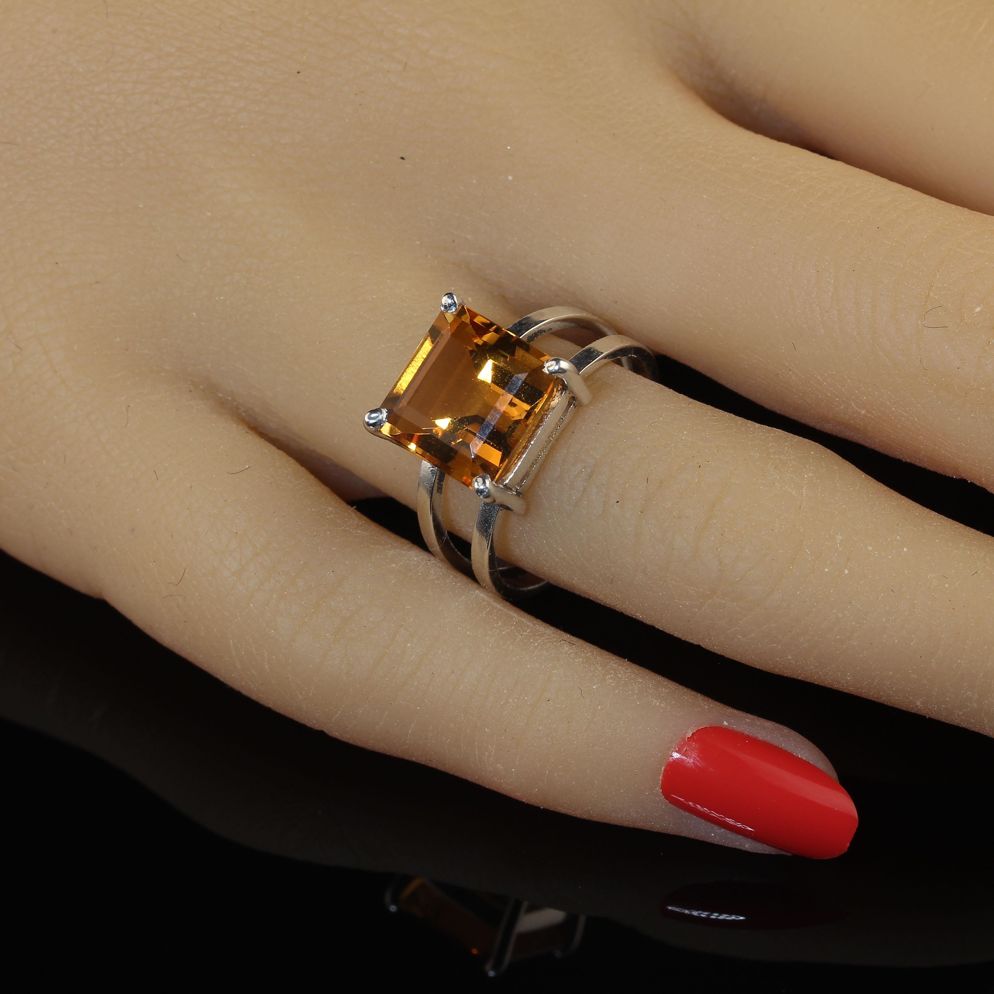 Unusual square cut 5.1CT Citrine in handmade Sterling Silver ring. This vibrant gemstone comes straight from our favorite vendor in Belo Horizonte, Minas Gerais, Brasil.  His craftsmen created the handmade Sterling Silver setting (2.95gms) to best