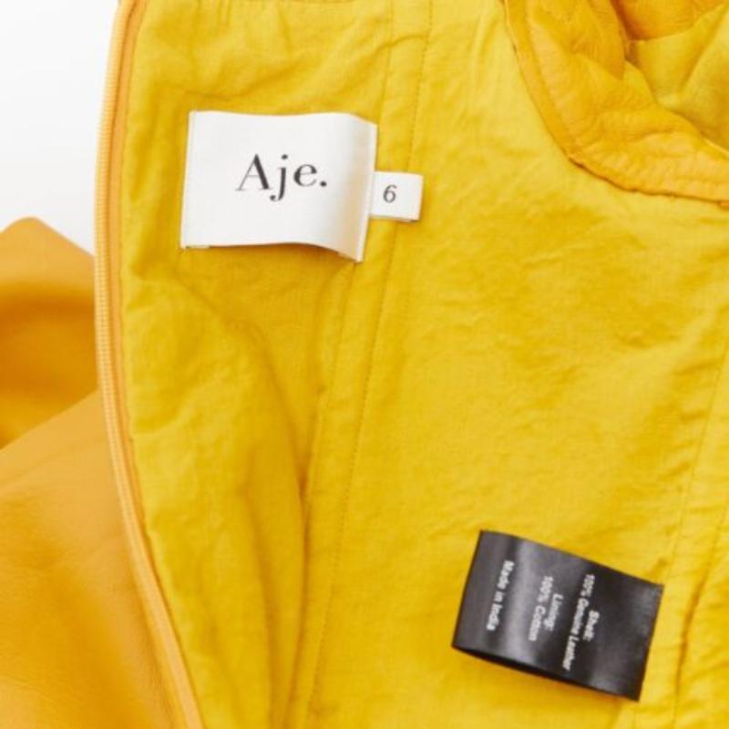 AJE 2019 Castellain mini vestido de cuero amarillo mostaza con mangas abullonadas UK6 XS en venta 2