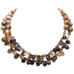 Collier A.Jeschel à 2 rangs en sardonyx facetté et perles d'or naturelles.