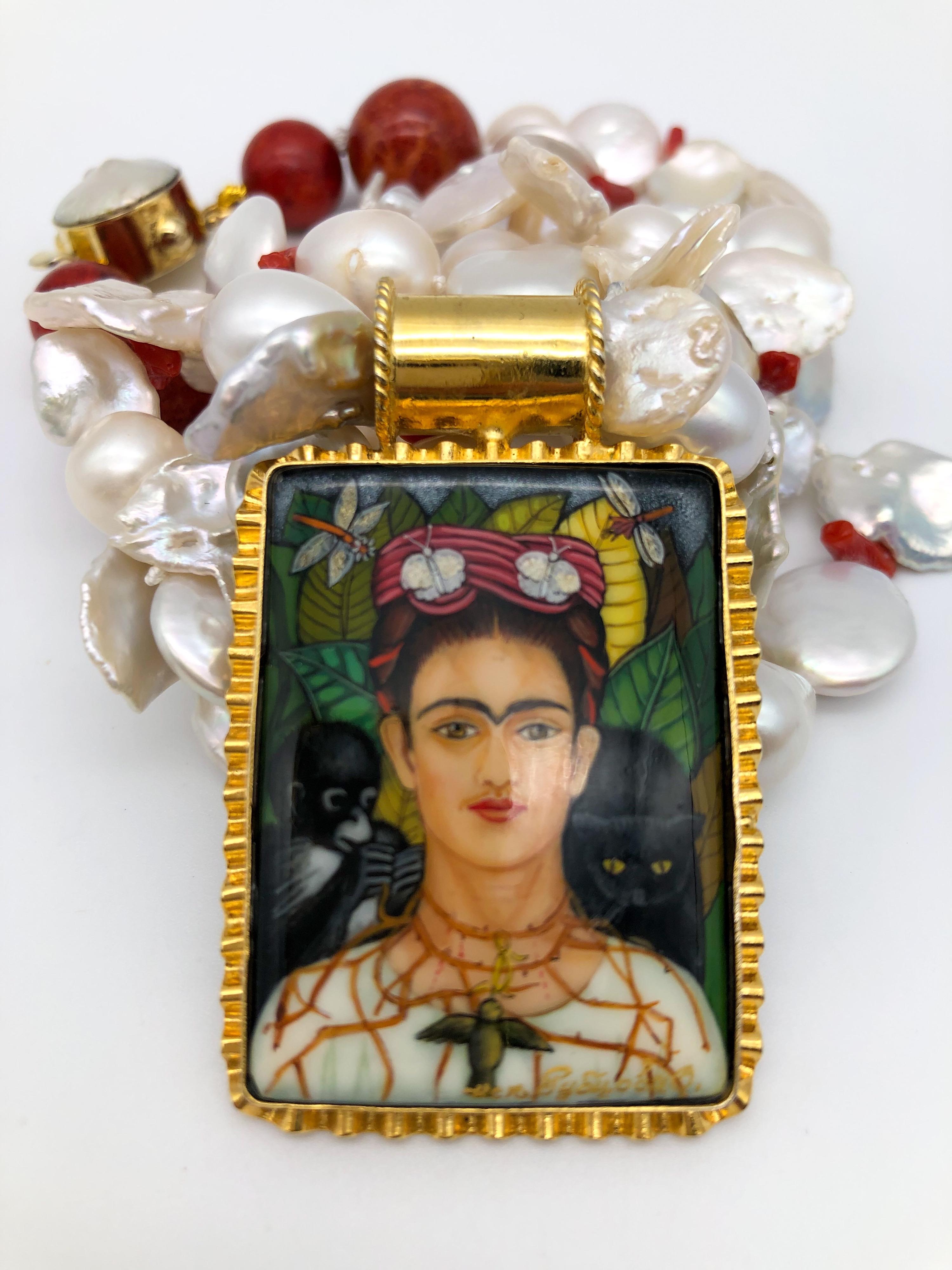 One-of-a-Kind

Sensational hand-painted miniature after Frida Kahlo’s Self-Portrait with Thorn( including the monkeys) Glorious hand-painted miniature portrait on Onyx. Set in a vermeil frame. Mixed coin and baroque pearl double strand complement