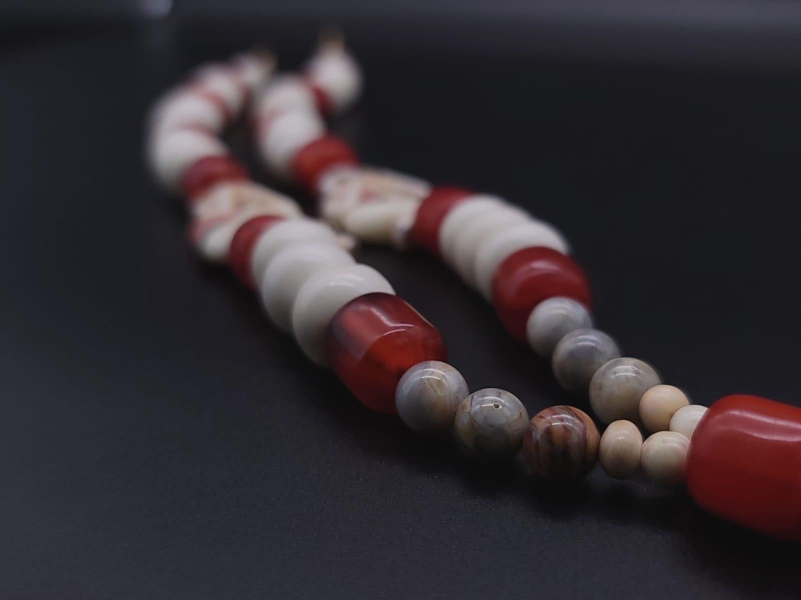 A.Jeschel 3 Wise monkeys in a Long Red Copal necklace 8
