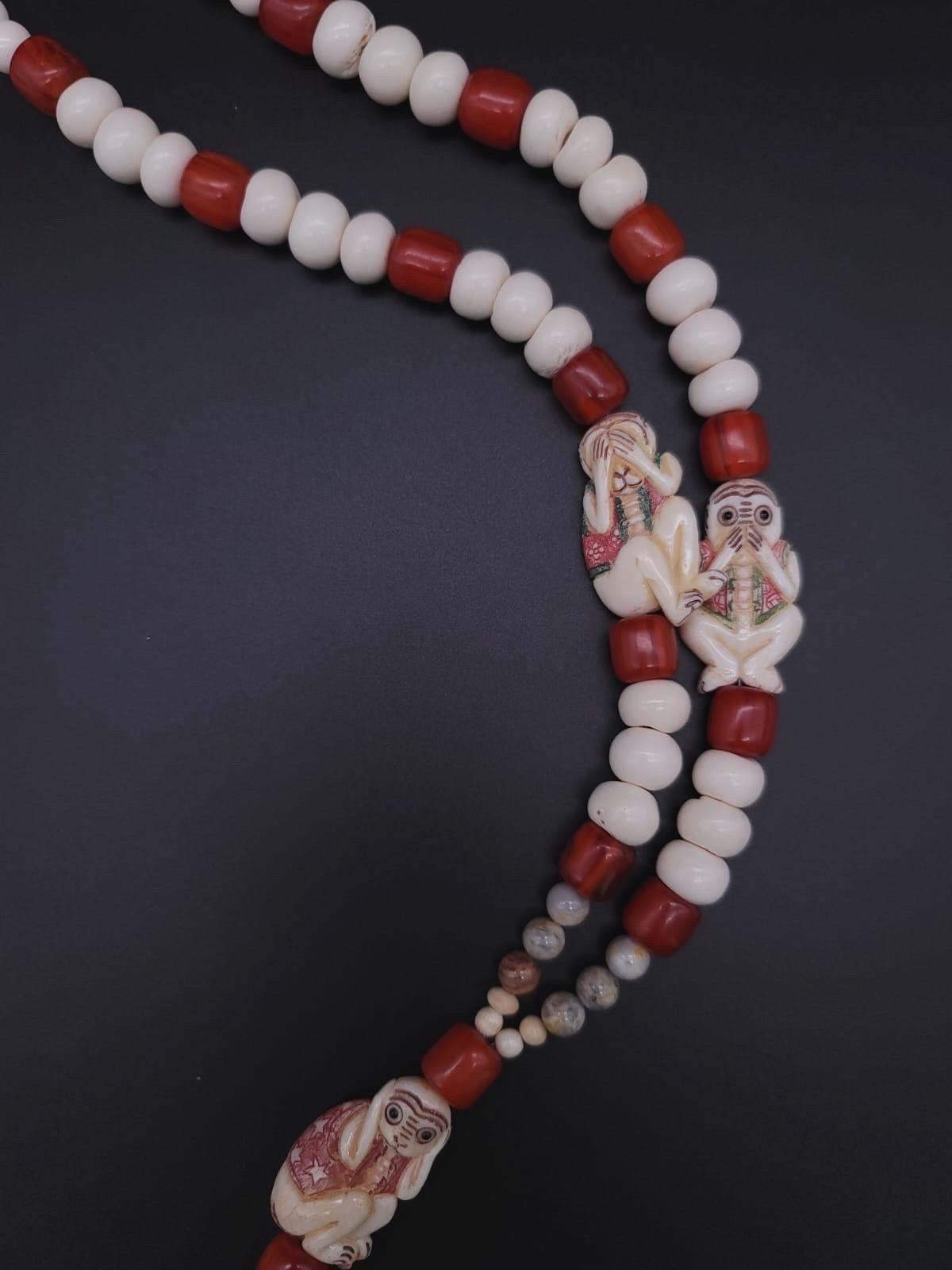 A.Jeschel 3 Wise monkeys in a Long Red Copal necklace  For Sale 11
