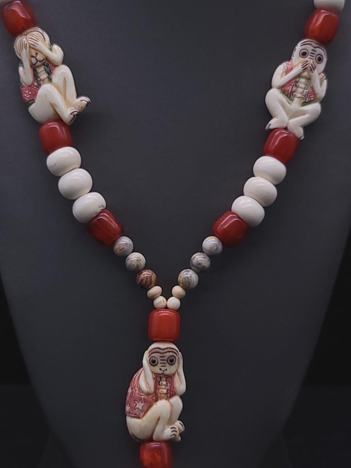 A.Jeschel 3 Wise monkeys in a Long Red Copal necklace  For Sale 12