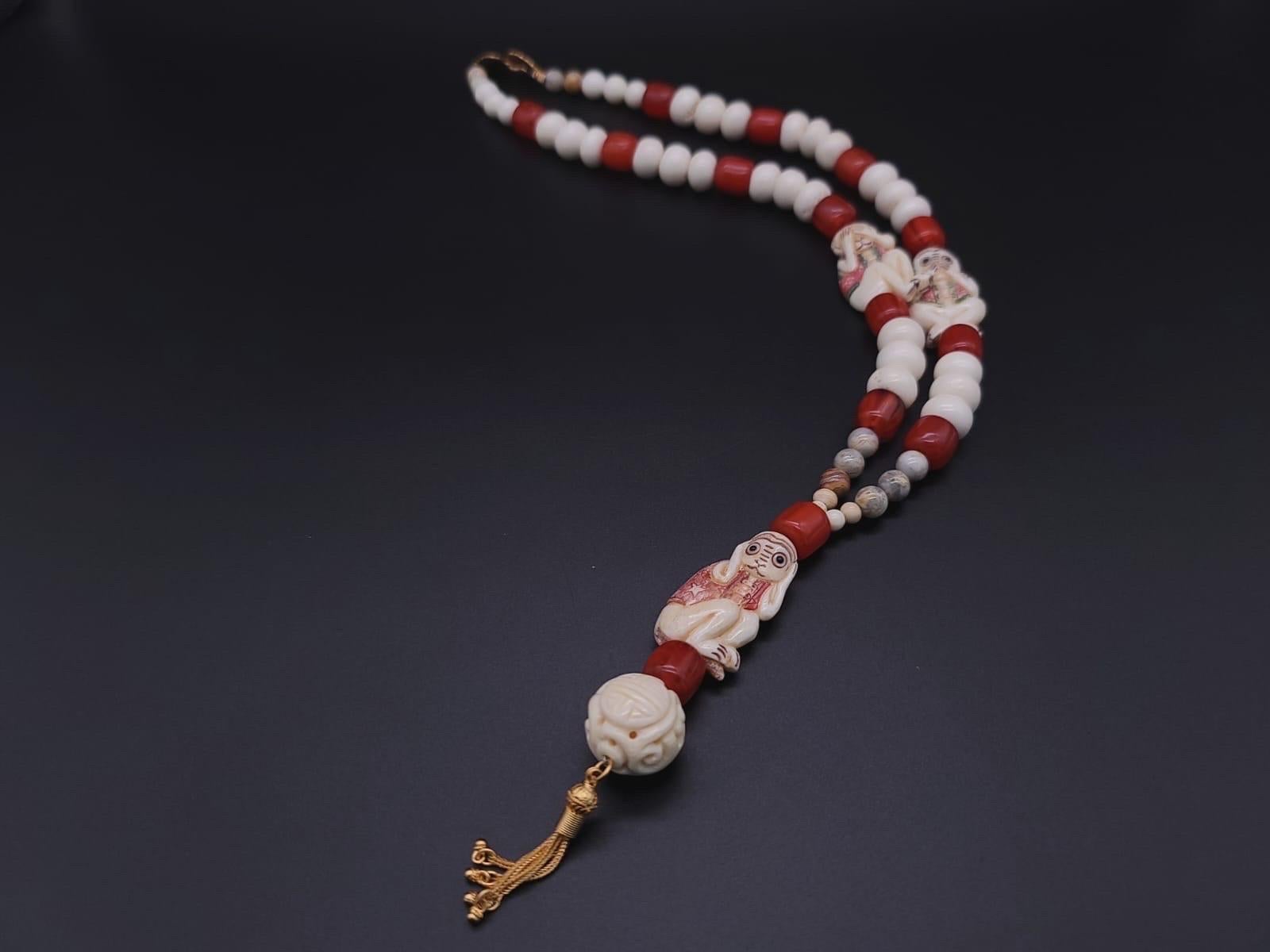 A.Jeschel 3 Wise monkeys in a Long Red Copal necklace 13