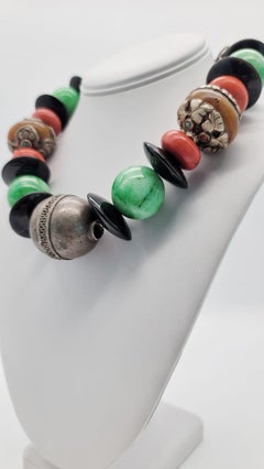 A.Jeschel A one of a kind necklace from around the world jade coral amber beads