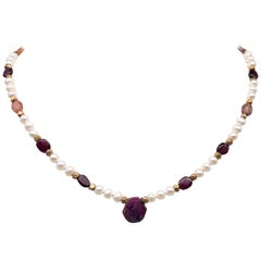 A.Jeschel A Ruby and Pearl necklace for your little princess.