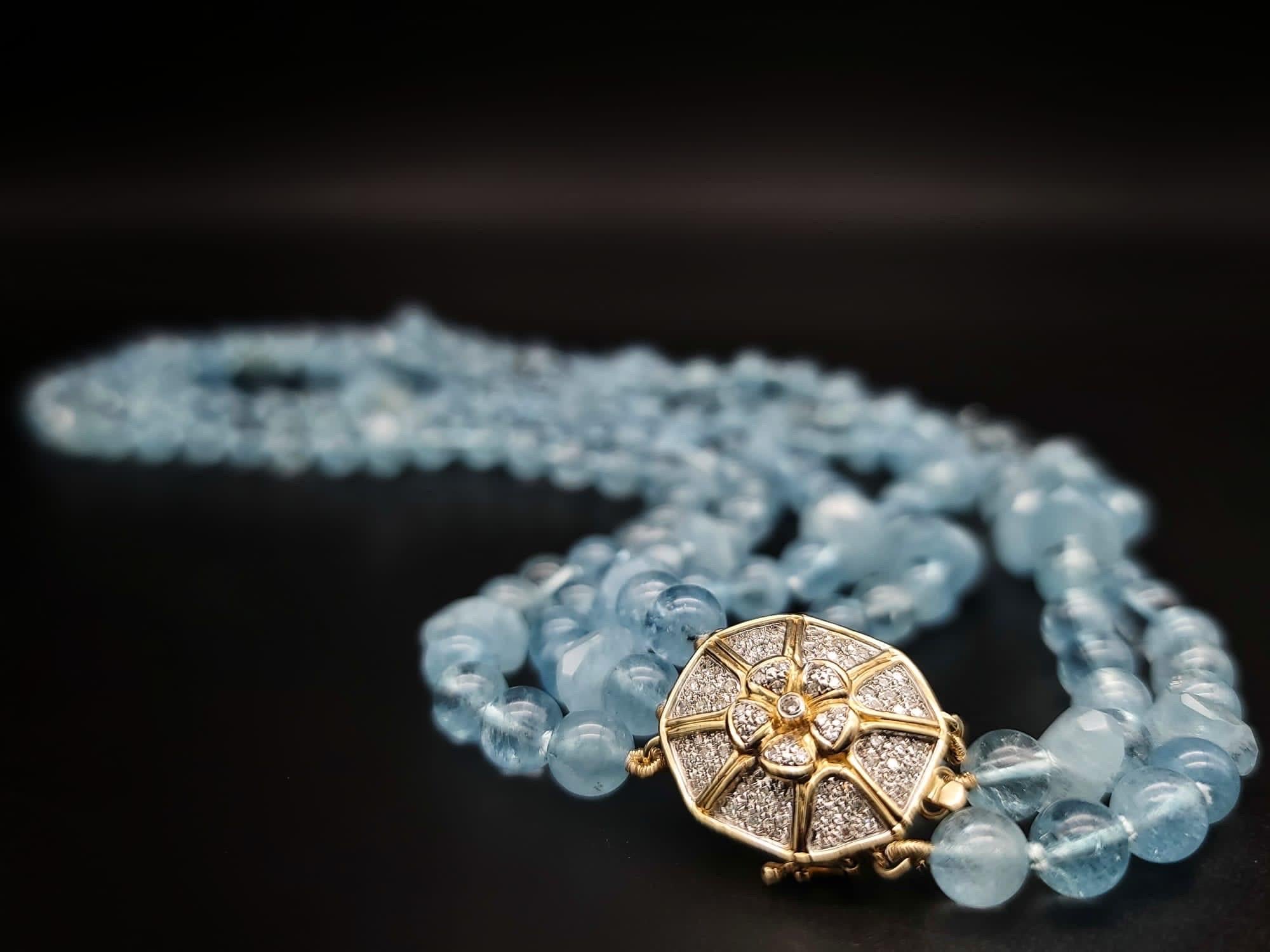 Mixed Cut A.Jeschel AAA Aquamarine necklace with a 14k Gold Diamond clasp.