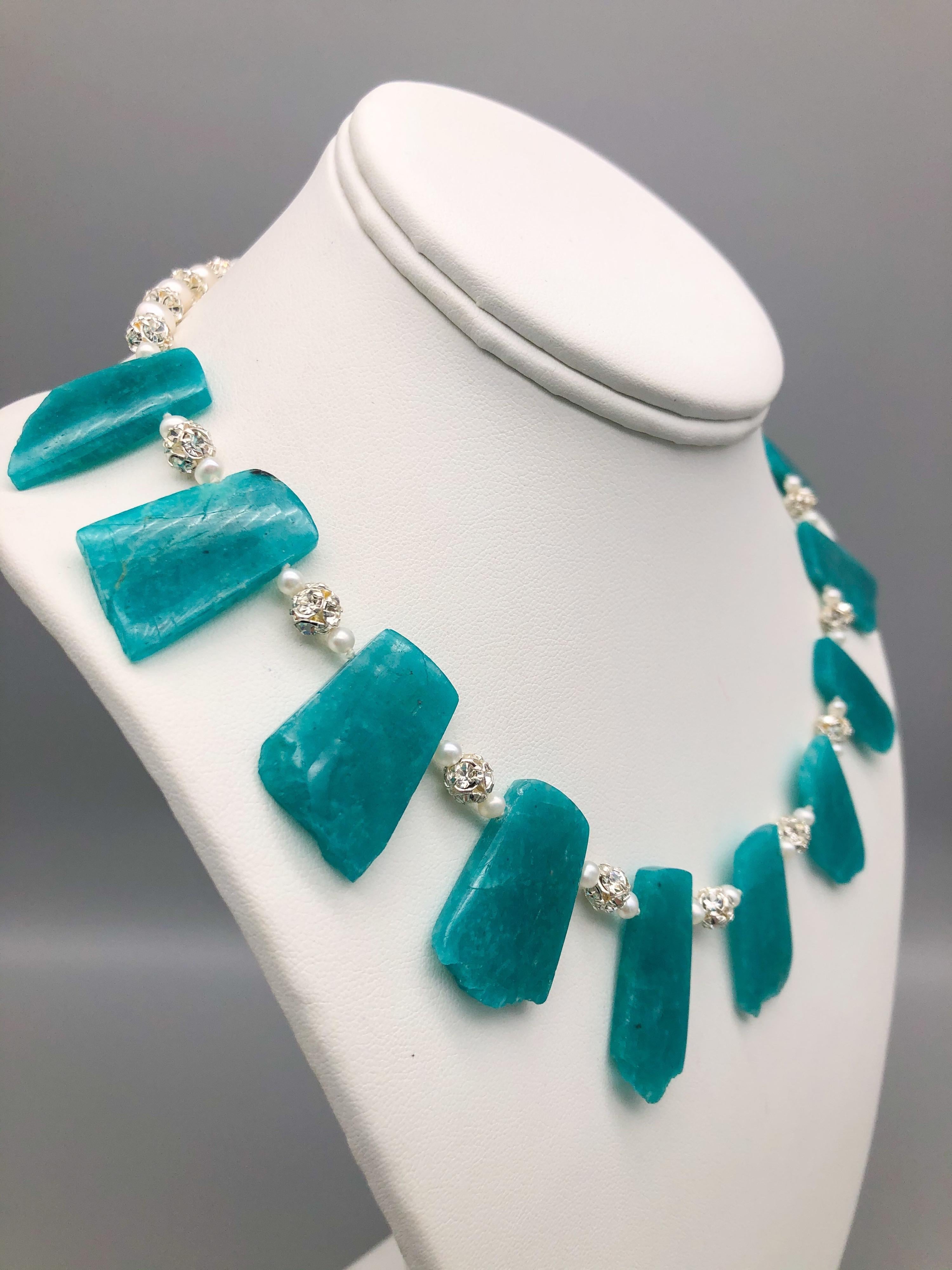 One-of-a-Kind
The polished Amazonite stones are separated by sterling silver and crystal balls that serve to enhance the rich blue-green. The stone was named for the Amazon River in the mistaken belief that the stone came from the river although it