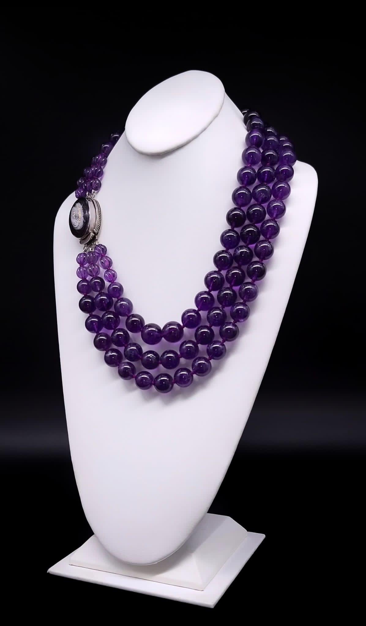 Contemporary A.Jeschel  Amethyst necklace with a Vintage Venetian glass clasp.