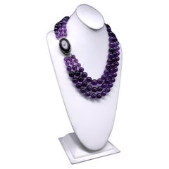 A.Jeschel  Amethyst necklace with a Vintage Venetian glass clasp.