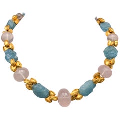 A.Jeschel Aquamarine meets faceted rose Quartz in an interesting way.