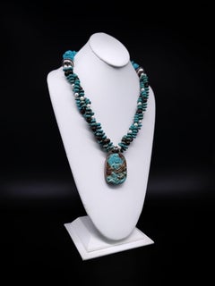 A.Jeschel Australian Opal and Turquoise necklace with a Buddha carved pendant.