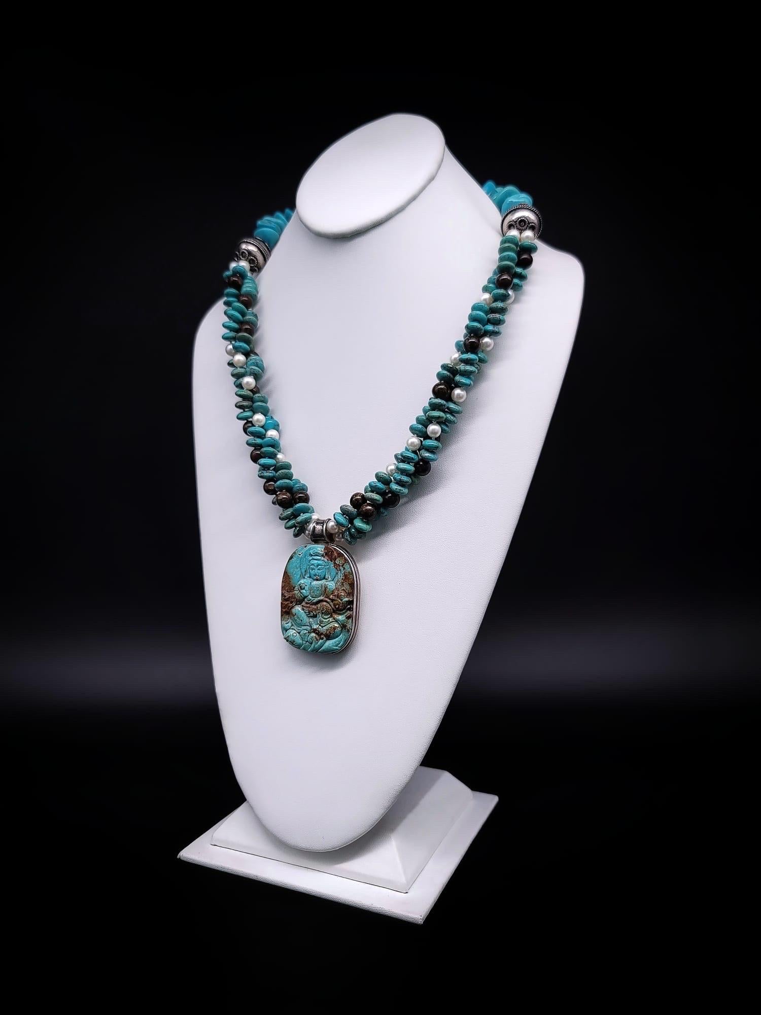 Contemporary A.Jeschel Australian Opal and Turquoise necklace with a Buddha carved pendant. For Sale